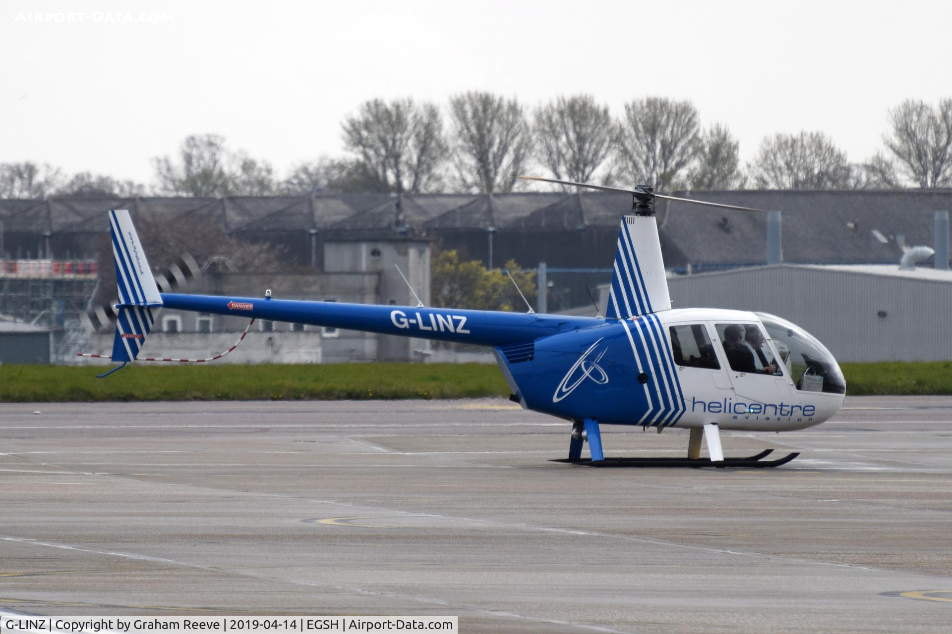 G-LINZ, 2007 Robinson R44 Raven II C/N 11911, Parked at Norwich.