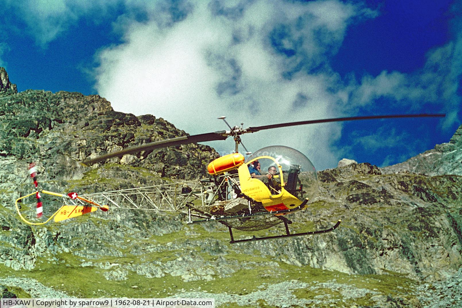 HB-XAW, 1958 Bell 47G-2 C/N 2180, HIGE at the Tschierva mountain cabin at 8480 ft amsl. Scanned from a Perutz-slide.