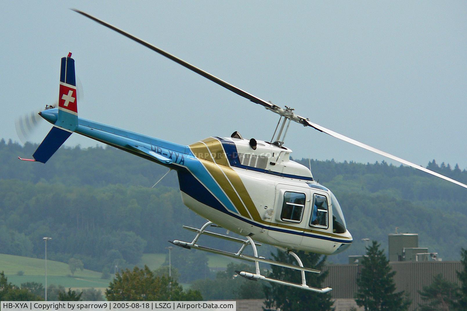 HB-XYA, 1980 Bell 206B JetRanger III C/N 3067, Departing Grenchen