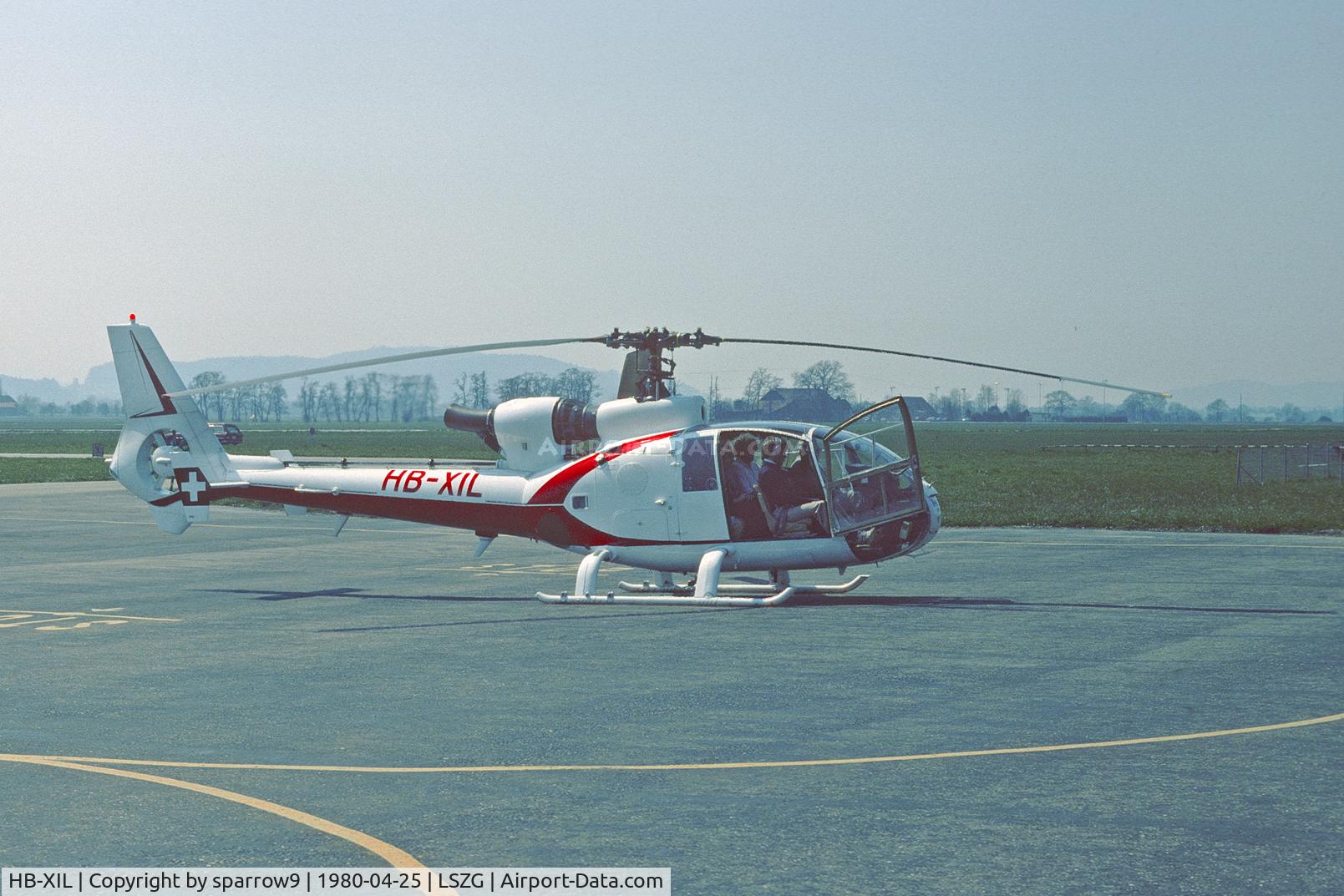 HB-XIL, 1973 Westland SA-341G Gazelle C/N WA1039, At Grenchen. HB-registered from 1979-09-18 until 1982-08-31. Scanned from a slide.