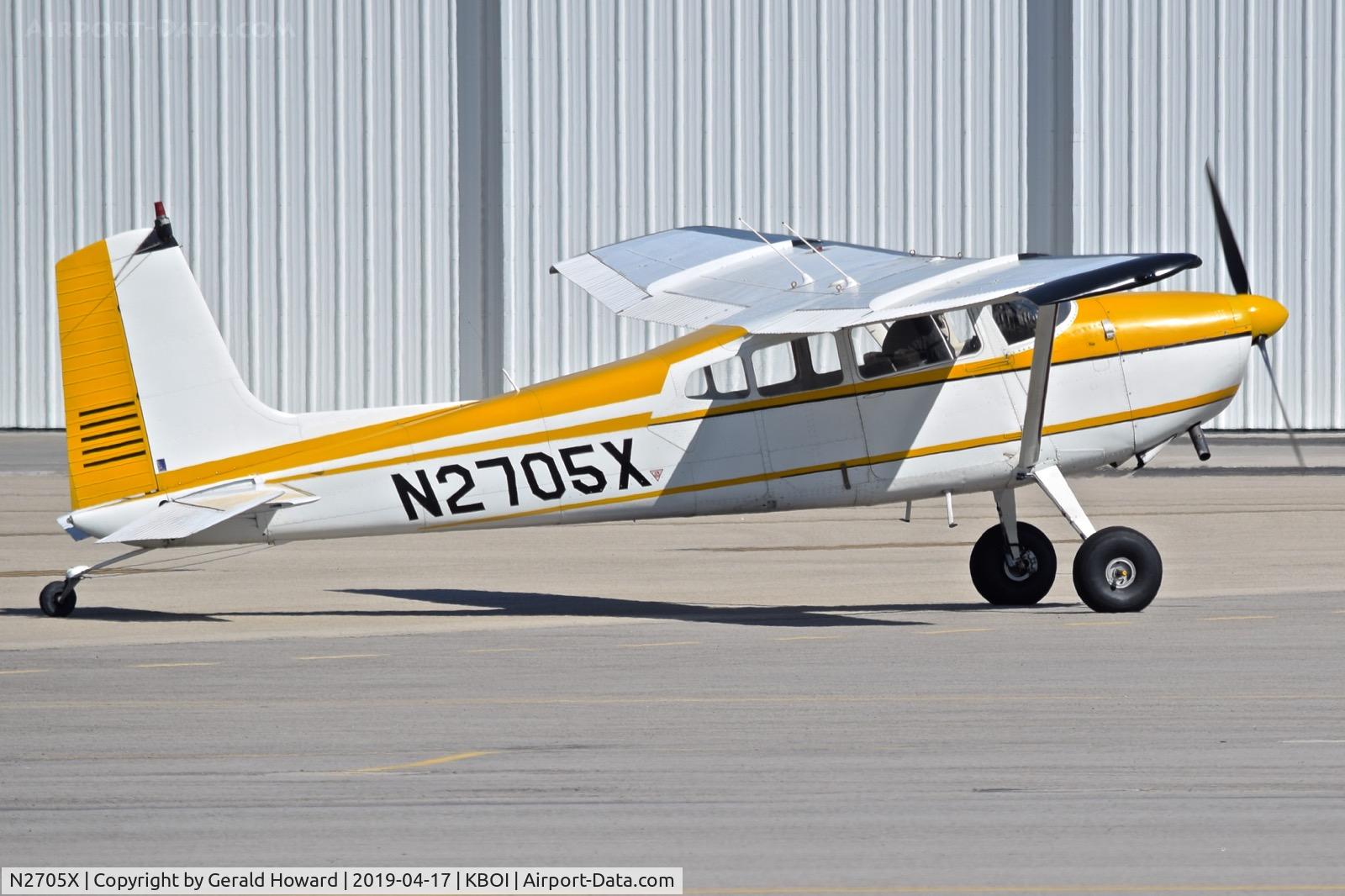 N2705X, 1965 Cessna 180H Skywagon C/N 18051505, Taxiing on north GA ramp.