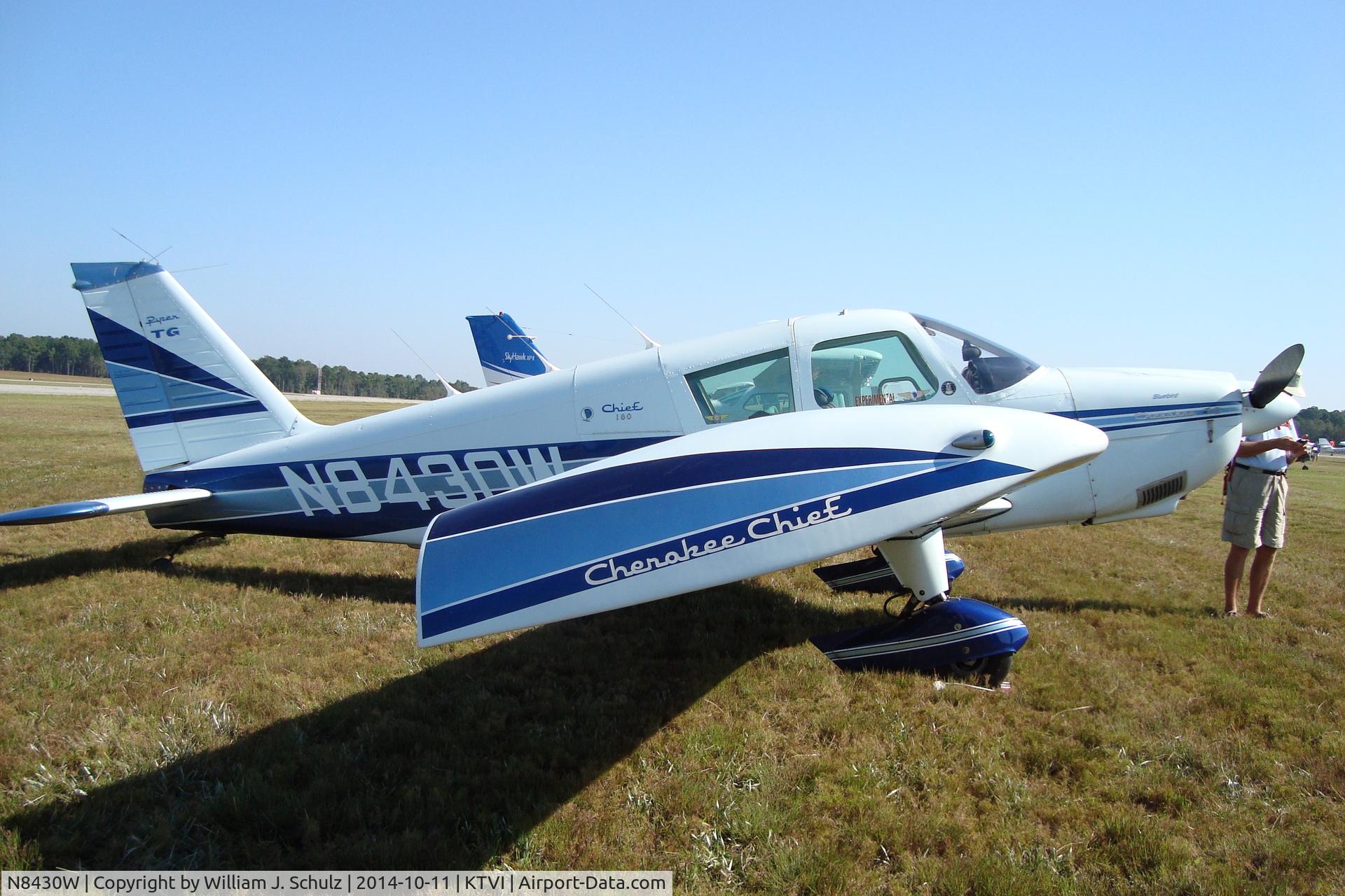 N8430W, 1965 Piper PA-28-180 C/N 28-2660, I shot this during the 2014 KTVI Fly-in. I had also seen it at Sun 'n Fun many years prior. This bird looks like something I'd like a ride in having logged many left seat hours at KGBR.