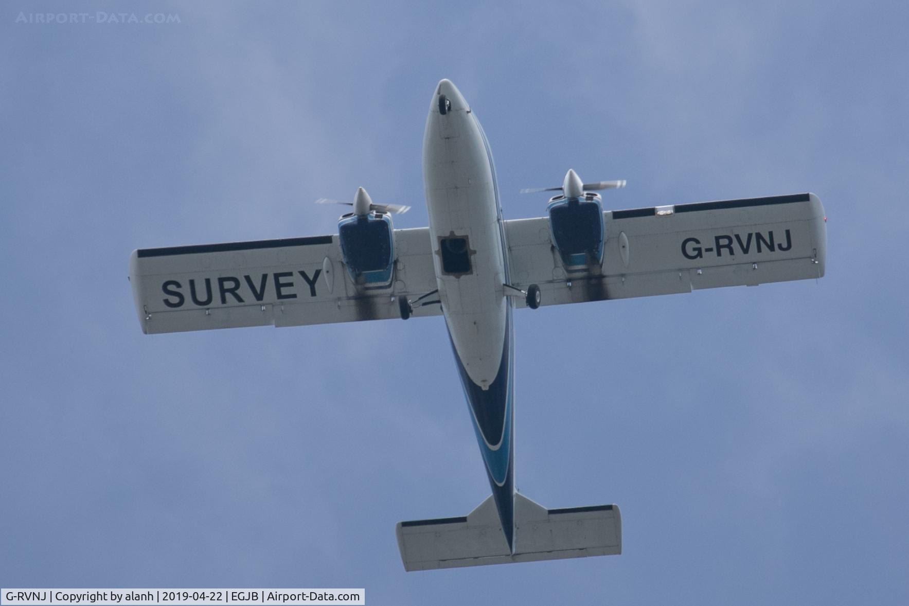 G-RVNJ, 1976 Partenavia P-68B C/N 52, Photo me, photo you! Aerial photo survey of Guernsey in progress, overhead St Peter Port.