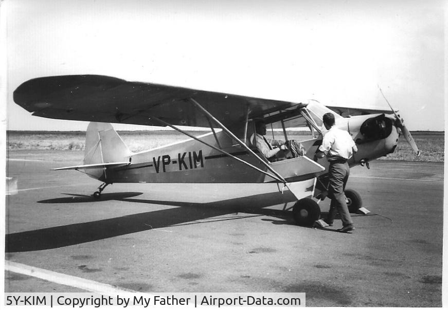 5Y-KIM, 1948 Piper J3C-65 Cub Cub C/N 18658-650, An old scanned print of mine taken at Wilson Airport, Kenya