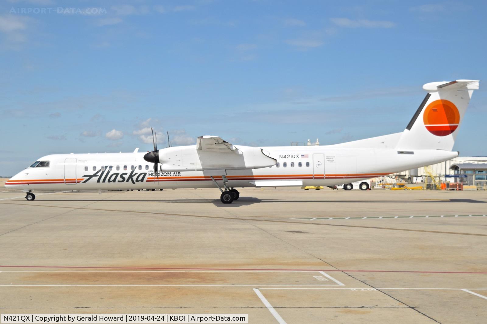 N421QX, 2007 De Havilland Canada DHC-8-402 Dash 8 C/N 4149, Taxiing out from the gate. Sporting a new retro paint job.