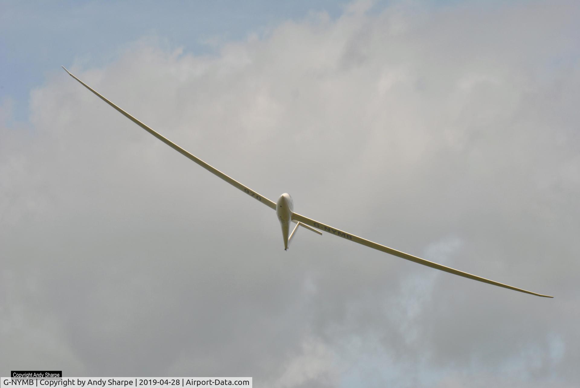 G-NYMB, 1993 Schempp-Hirth Nimbus 3DT C/N 63, That was surprise when looking left to seeing this glider coming straight at us sat on Leckhampton Hill today. Amazing low flypass with brilliant audio from wings cutting across the sky trying the find lift.