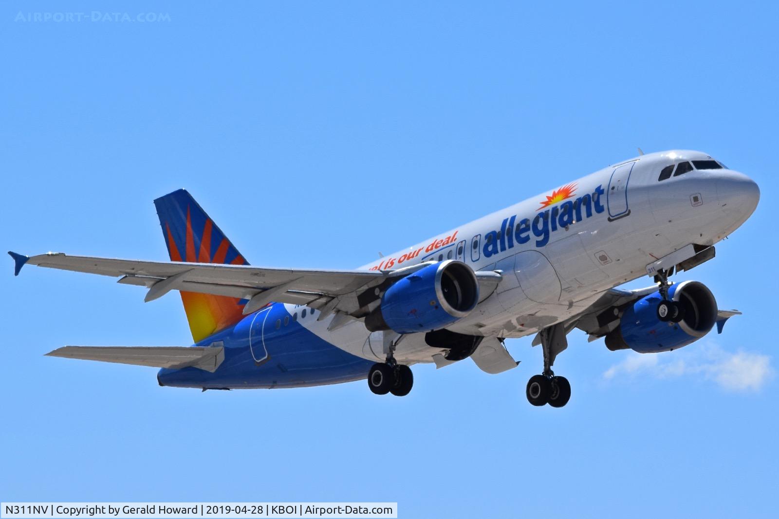 N311NV, 2006 Airbus A319-111 C/N 2702, Climb out from RWY 28R.