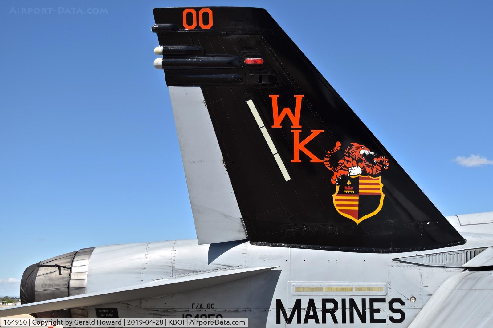 164950, McDonnell Douglas F/A-18C Hornet C/N 1250/C374, WK-00 parked on the north GA ramp.  VMFA(AW)-224 