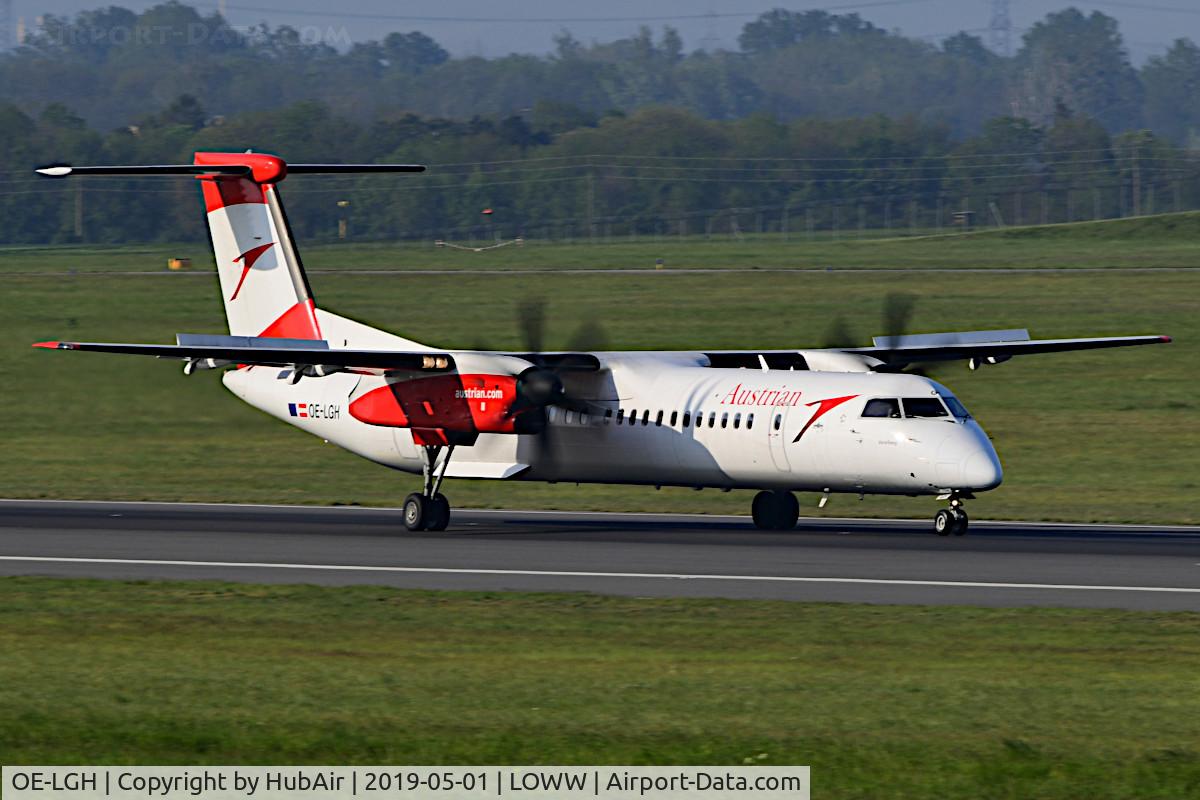 OE-LGH, 2002 De Havilland Canada DHC-8-402Q Dash 8 C/N 4075, Arrival RWY 34 on a sunny but stormy day