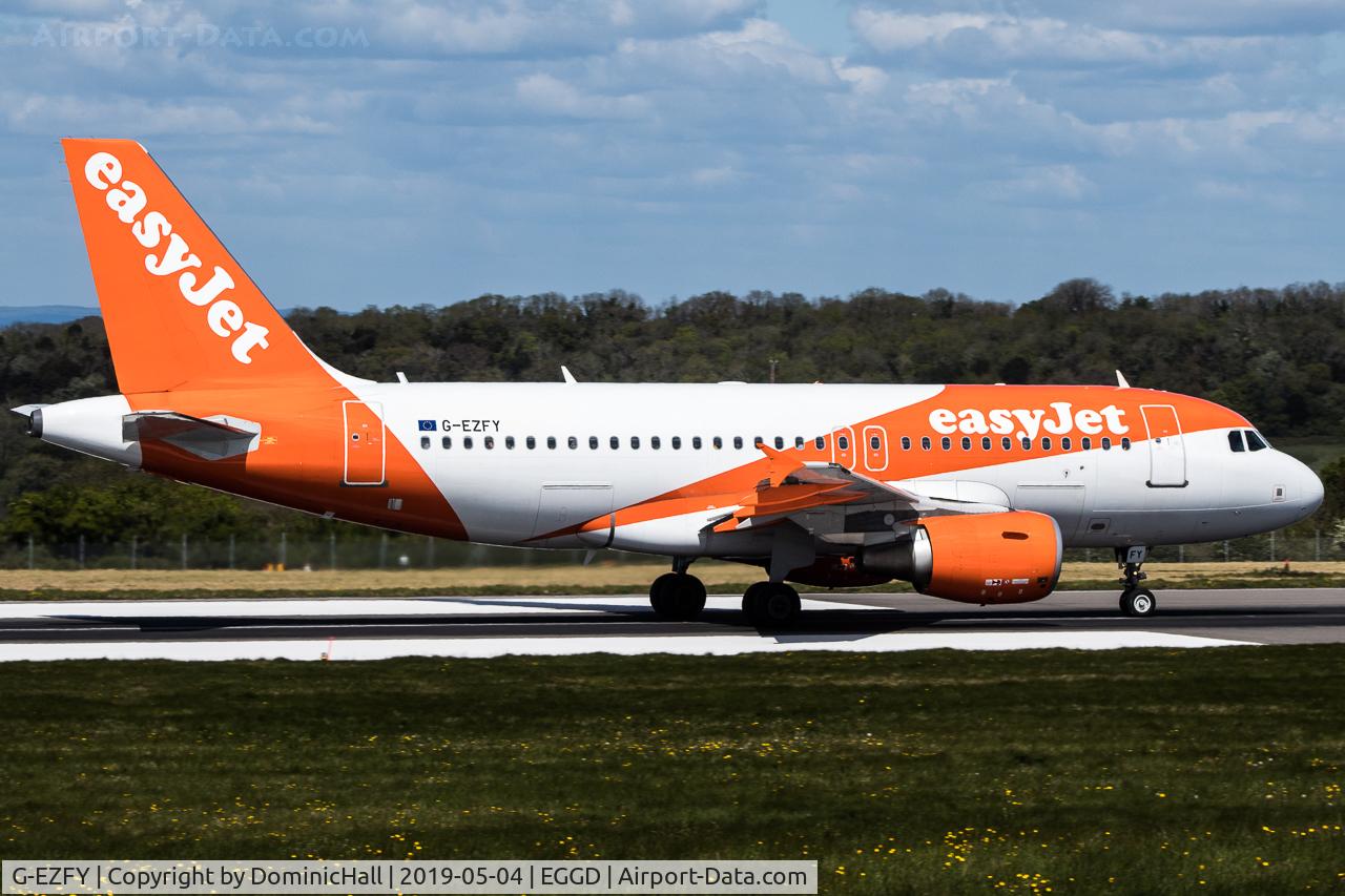 G-EZFY, 2010 Airbus A319-111 C/N 4418, Departing RWY 09