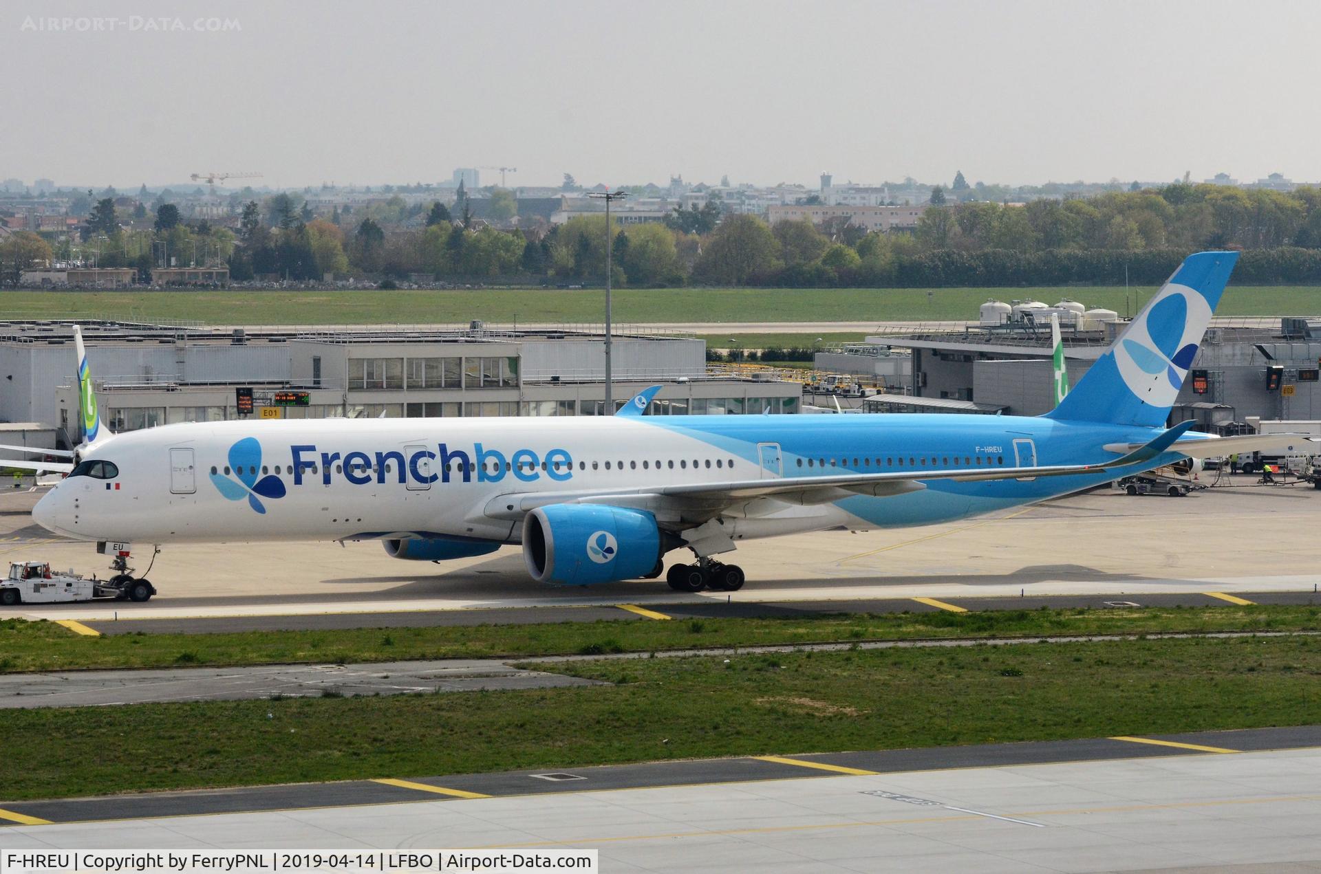 F-HREU, 2014 Airbus A350-941 C/N 005, French Bee A359 under tow to its gate.