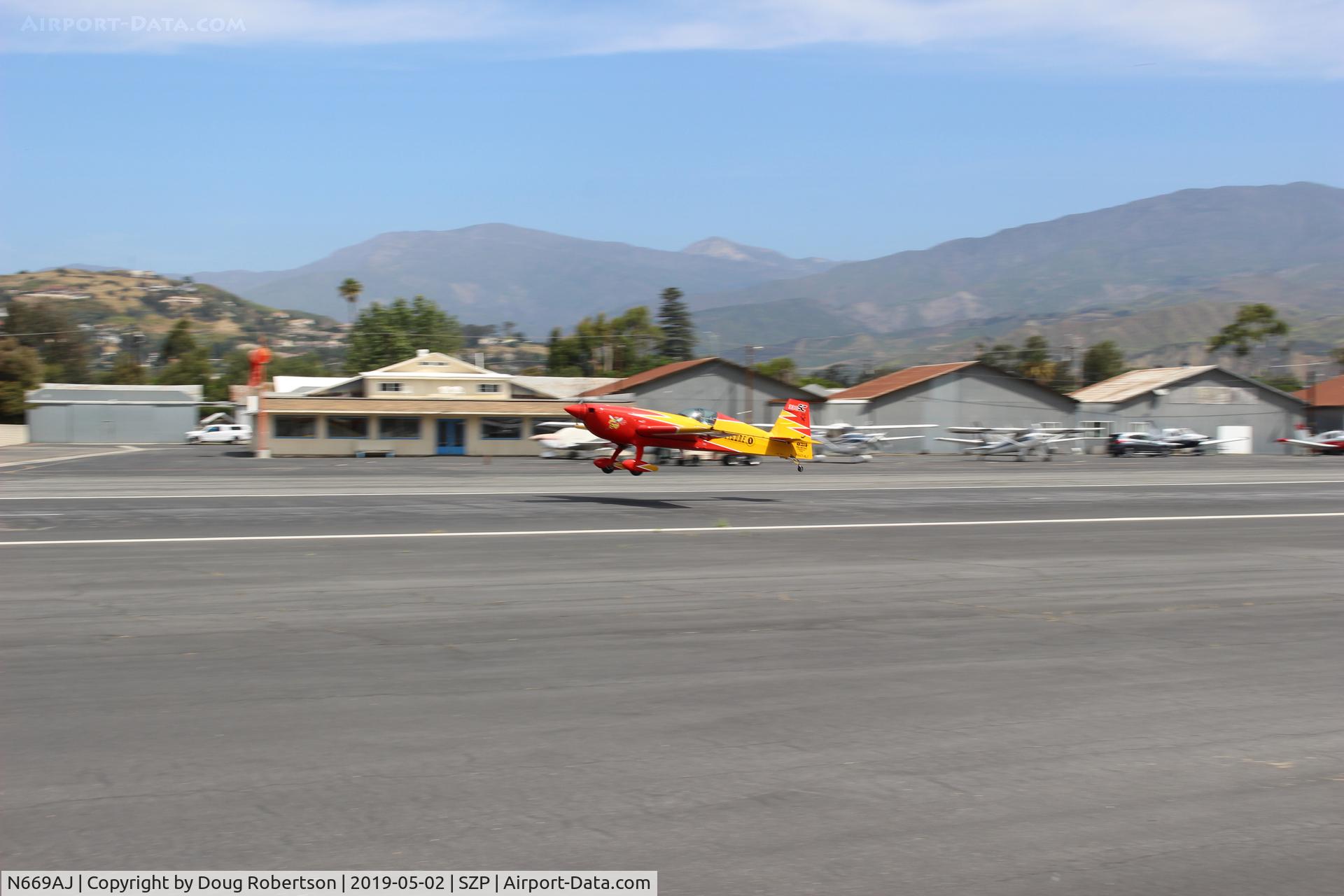 N669AJ, Extra EA-330SC C/N SC001E, EXTRA FLUGZEUGPRODUKTIONS EA300/SC, unknown engine, takeoff climb Rwy 22