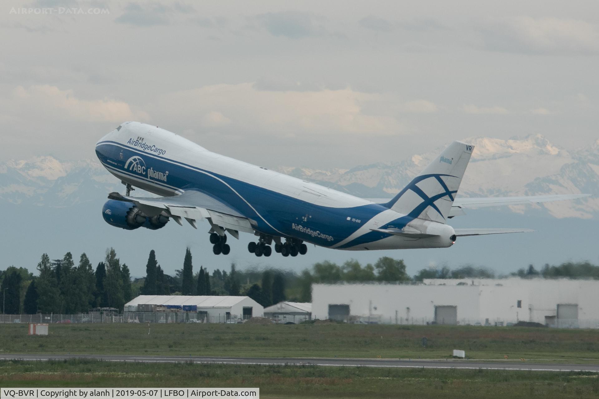 VQ-BVR, 2014 Boeing 747-867F/SCD C/N 60687, Departing Toulouse Blagnac with a snowy Pyrenees backdrop