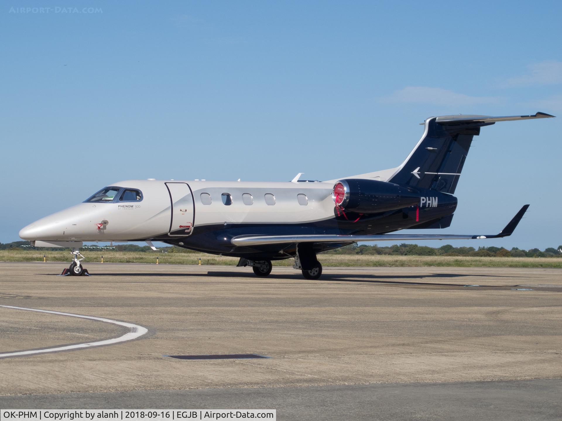 OK-PHM, 2018 Embraer EMB-505 Phenom 300 C/N 50500445, Outside Aigle hangar, Guernsey