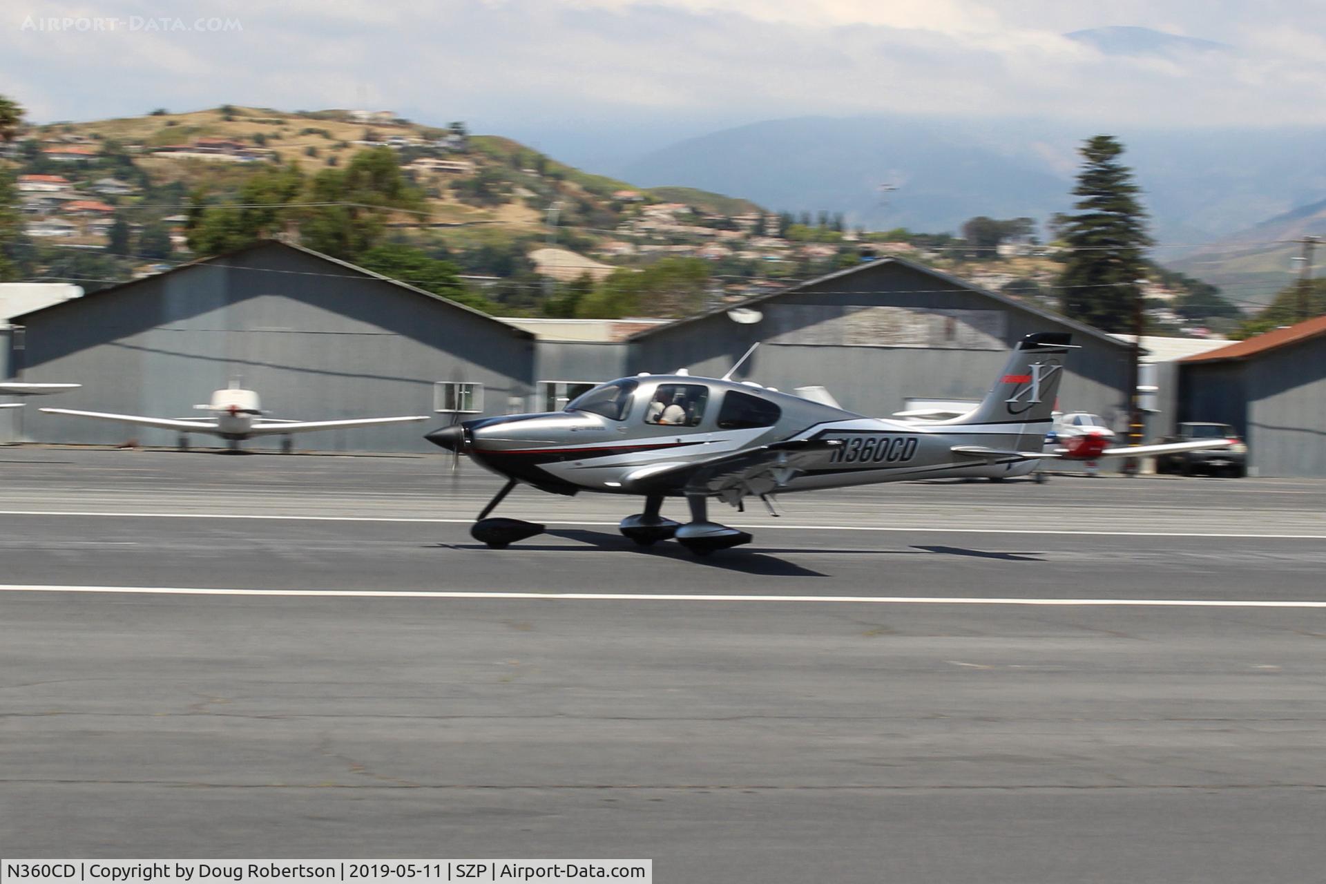 N360CD, 2009 Cirrus SR22 C/N 3516, 2009 Cirrus SR22, Continental IO-550-N 310 Hp, 3 blade CS prop, takeoff roll Rwy 22. Interesting color scheme!
