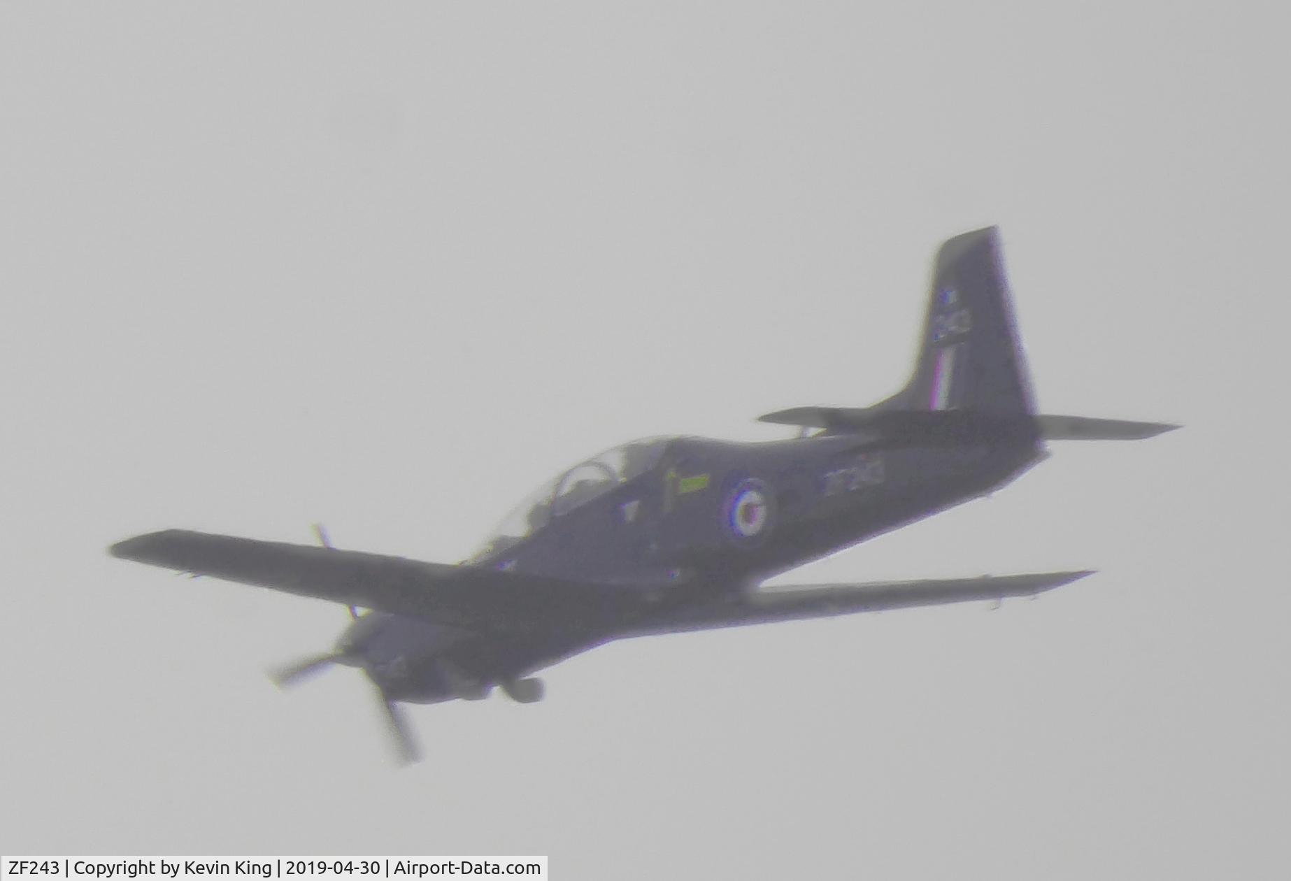 ZF243, 1990 Short S-312 Tucano T1 C/N S048/T44, Photographed flying over Lofthouse, N. Yorks. Silhoutted against sky: but digital enhancement revealed fuselage markings.