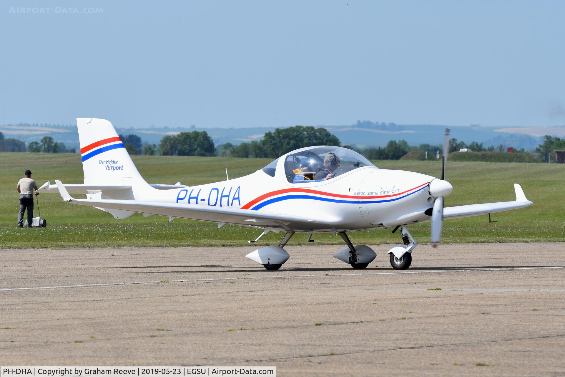 PH-DHA, 2012 Aquila A210 (AT01) C/N AT01-245, Just landed at Duxford.