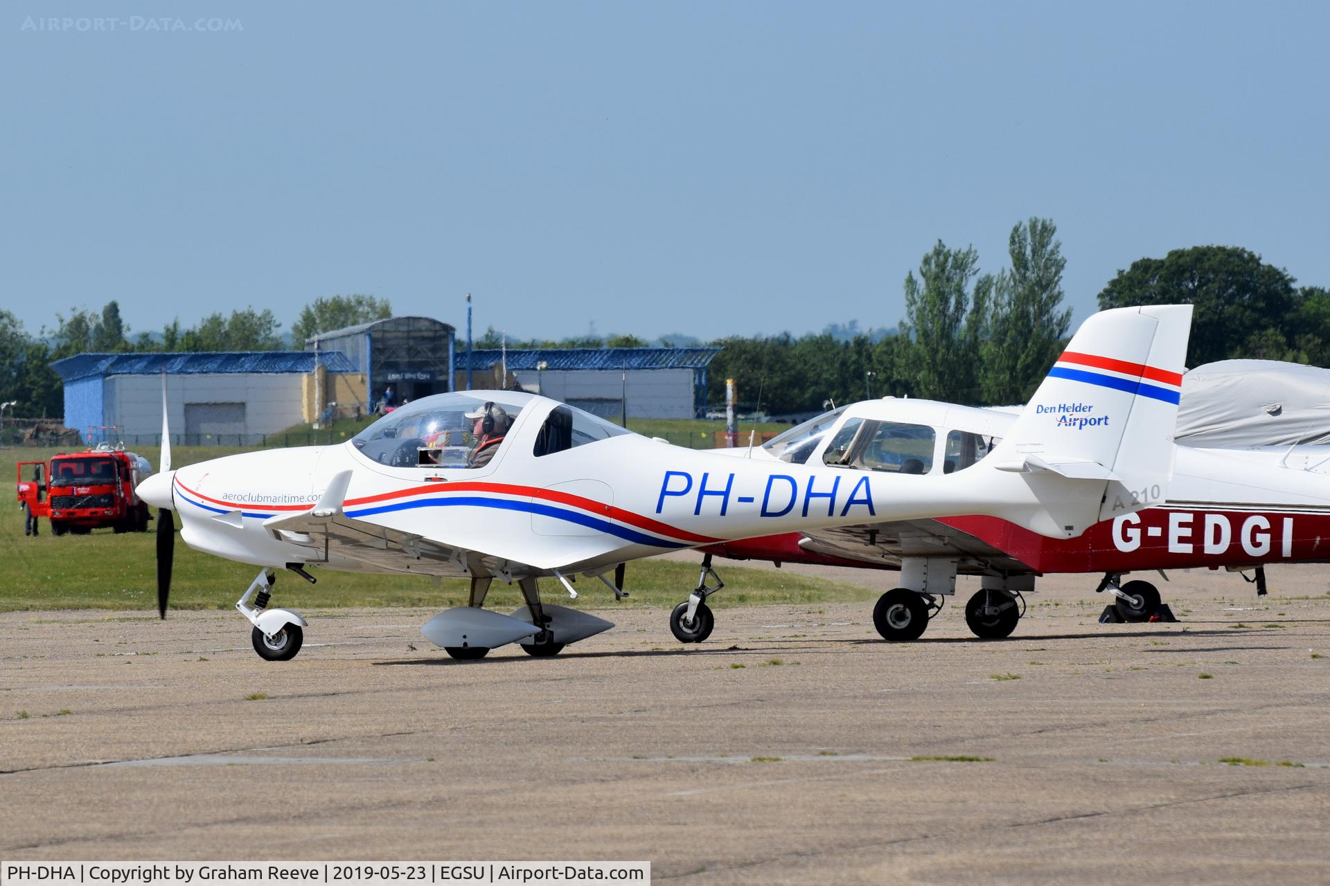 PH-DHA, 2012 Aquila A210 (AT01) C/N AT01-245, Just landed at Duxford.