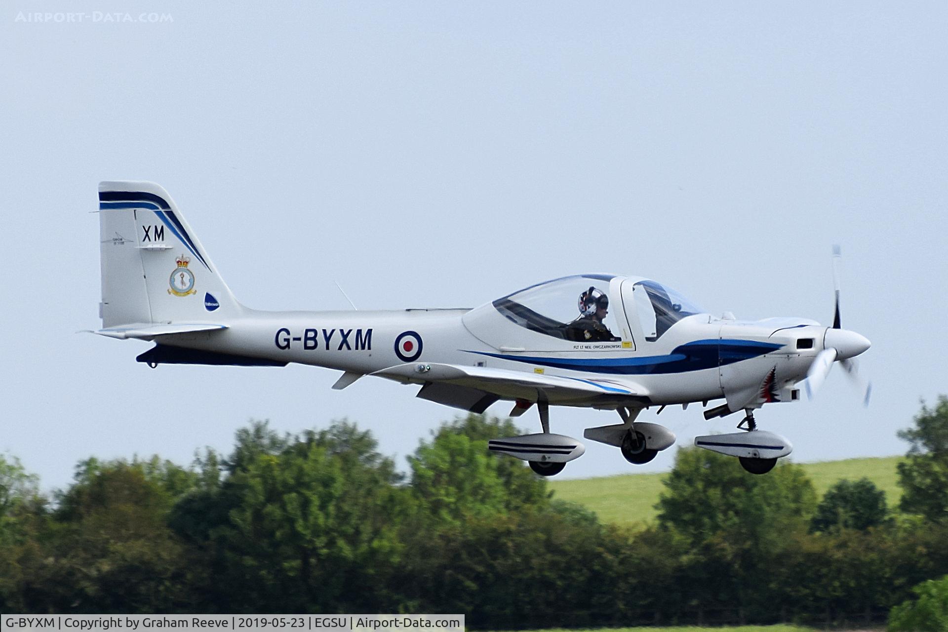 G-BYXM, 2001 Grob G-115E Tutor T1 C/N 82173/E, Landing at Duxford.