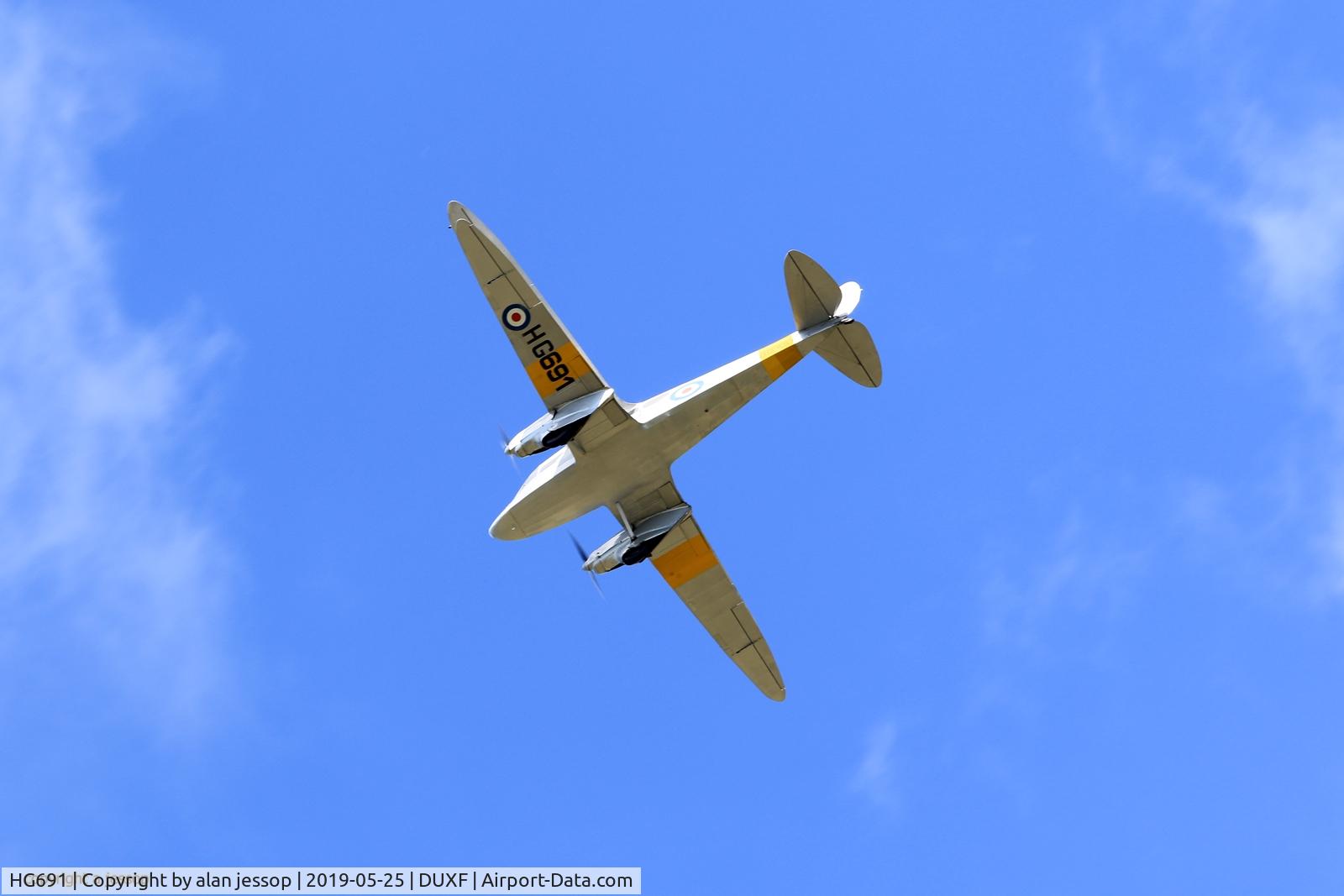 HG691, 1943 De Havilland DH-89A Dominie/Dragon Rapide C/N 6676, Took the shot from a field near Duxford