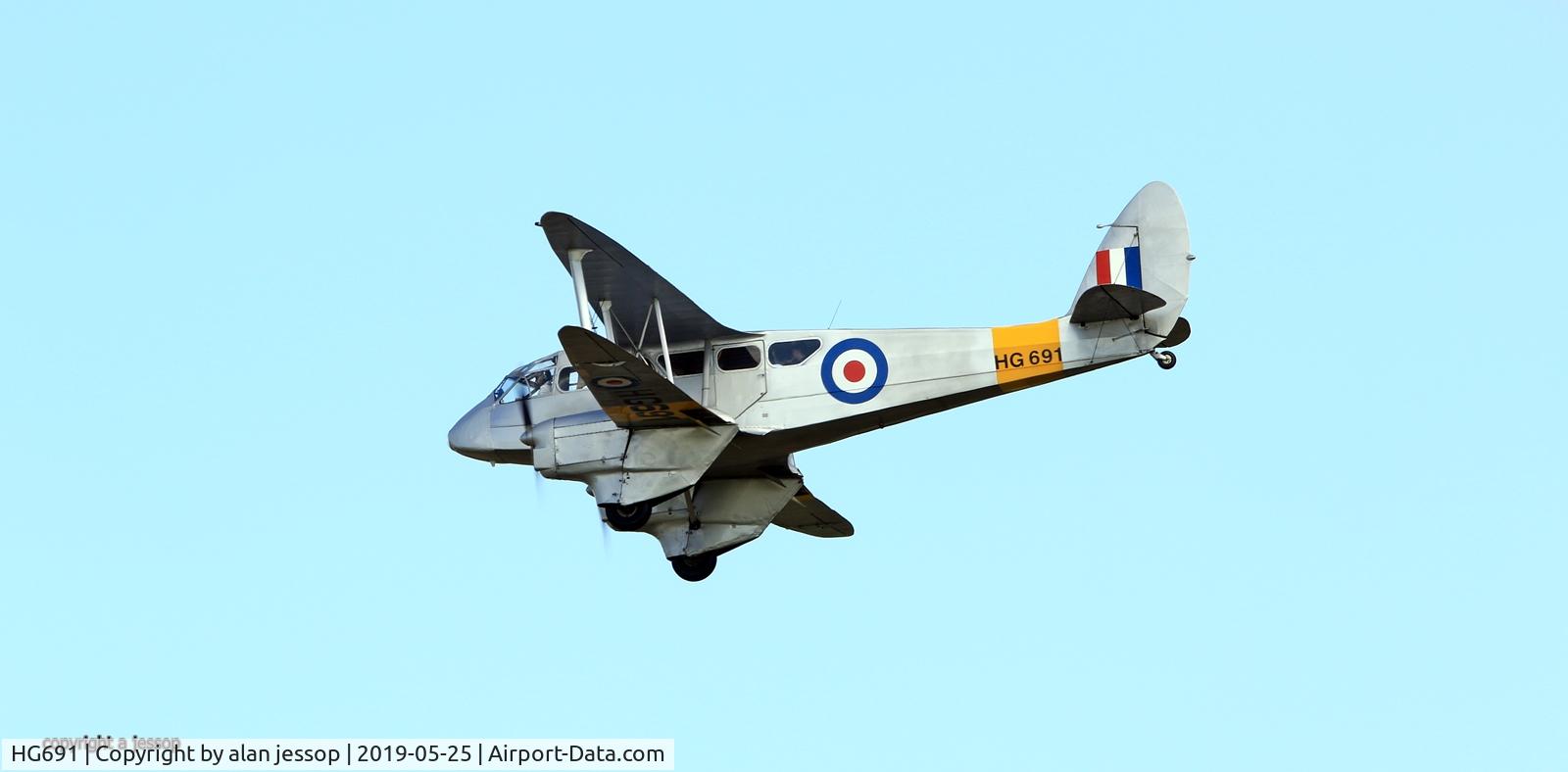 HG691, 1943 De Havilland DH-89A Dominie/Dragon Rapide C/N 6676, Taken from a field near Duxford