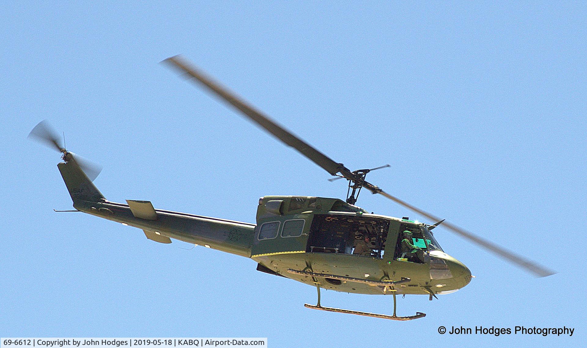 69-6612, 1969 Bell UH-1N Iroquois C/N 31018, 415th RQS Huey flying out