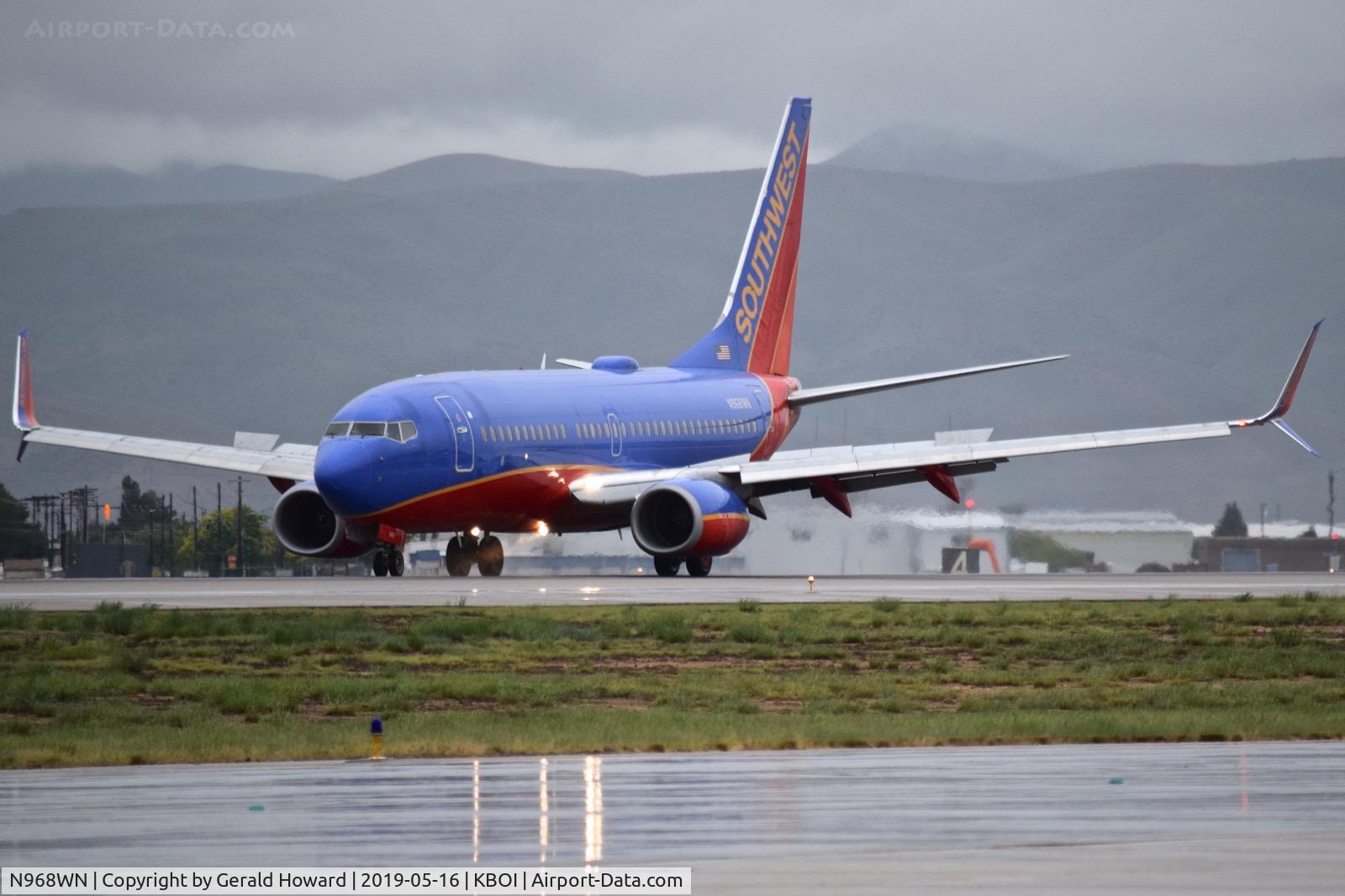 N968WN, 2011 Boeing 737-7H4 C/N 36679, Landing roll out on RWY 28L.