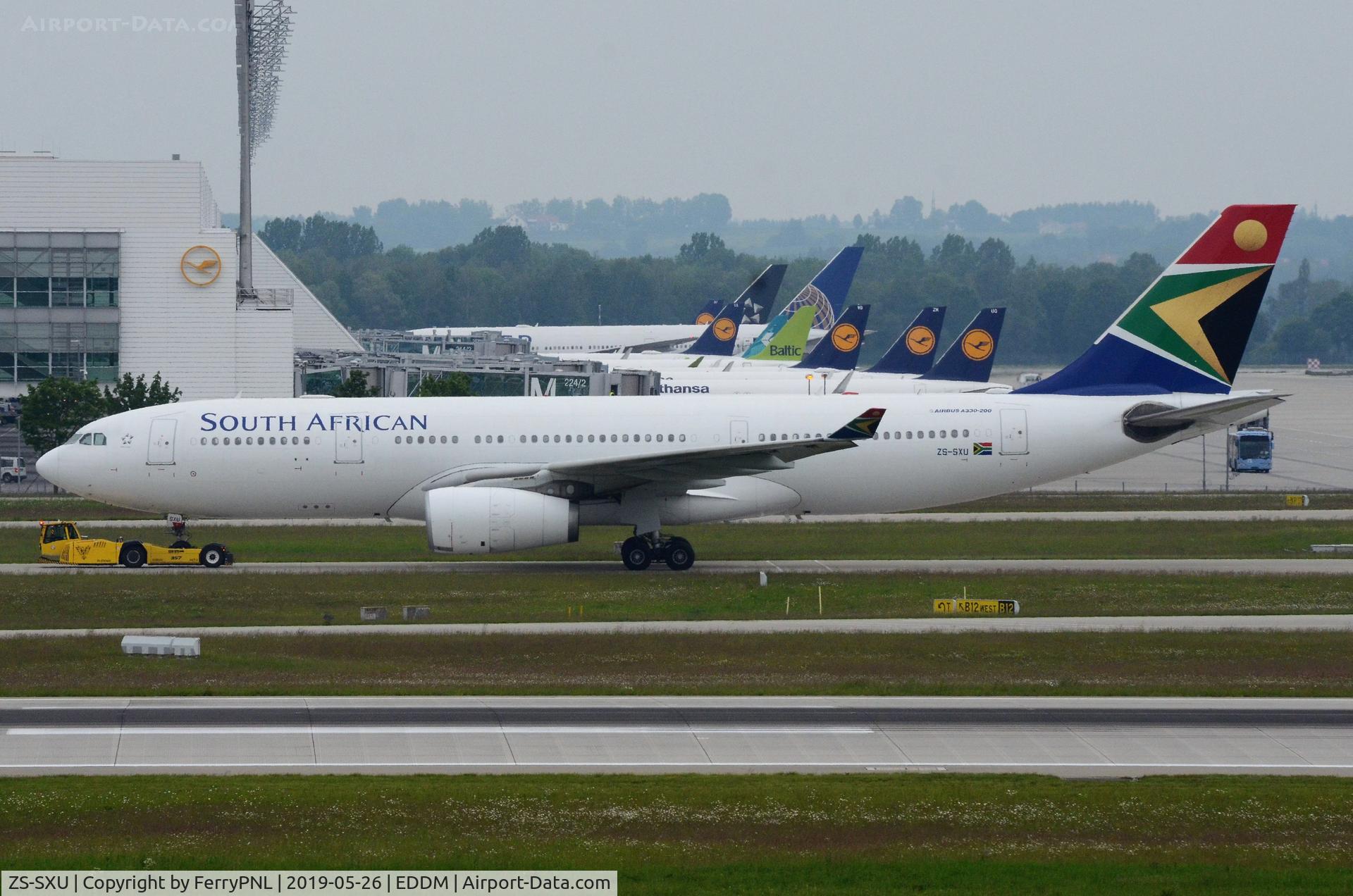 ZS-SXU, 2011 Airbus A330-243 C/N 1271, South African A332 under tow to parking stand.