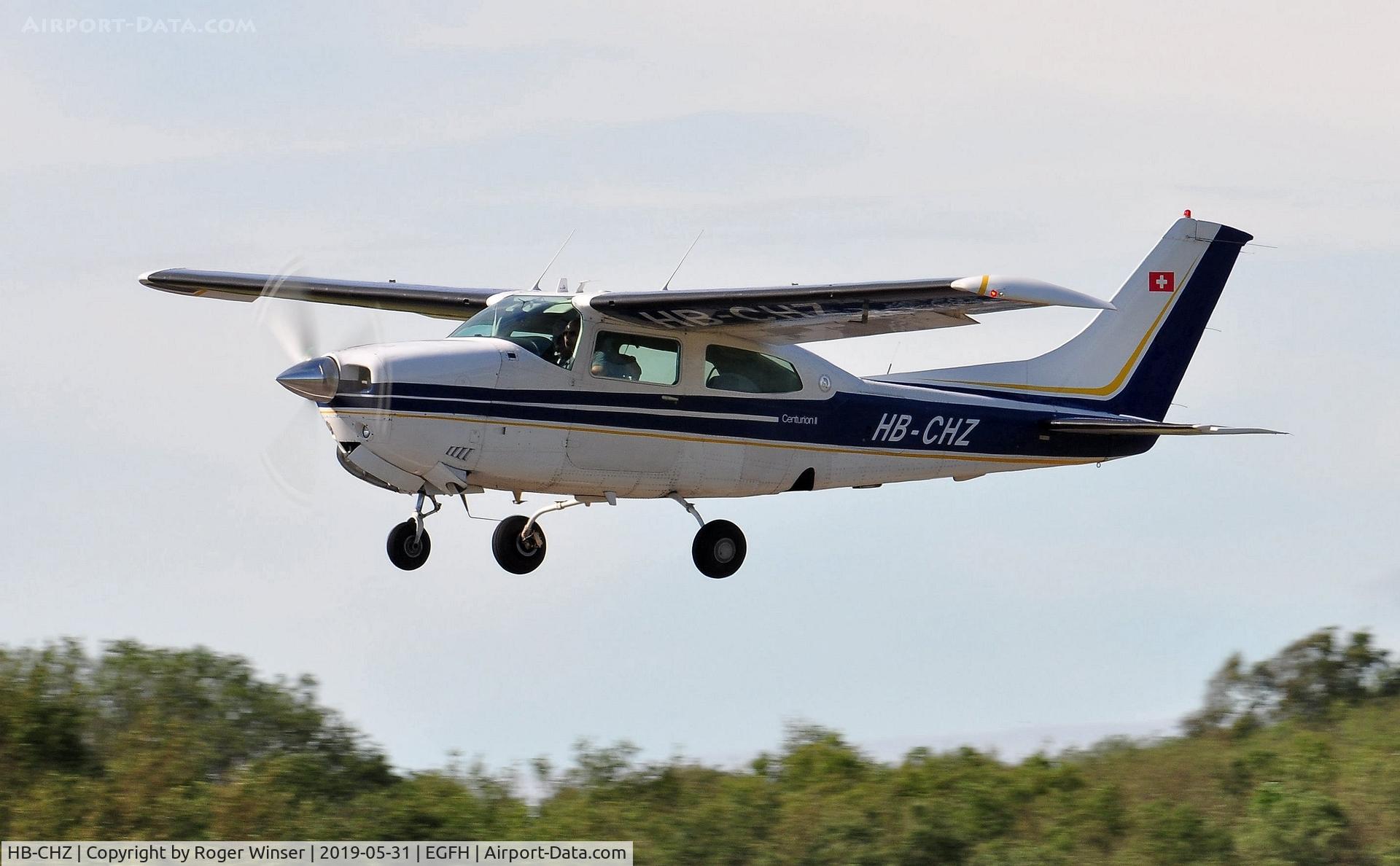 HB-CHZ, 1976 Cessna 210L Centurion C/N 210-61320, Visiting Cessna 210L Centurion departing Runway 22.
