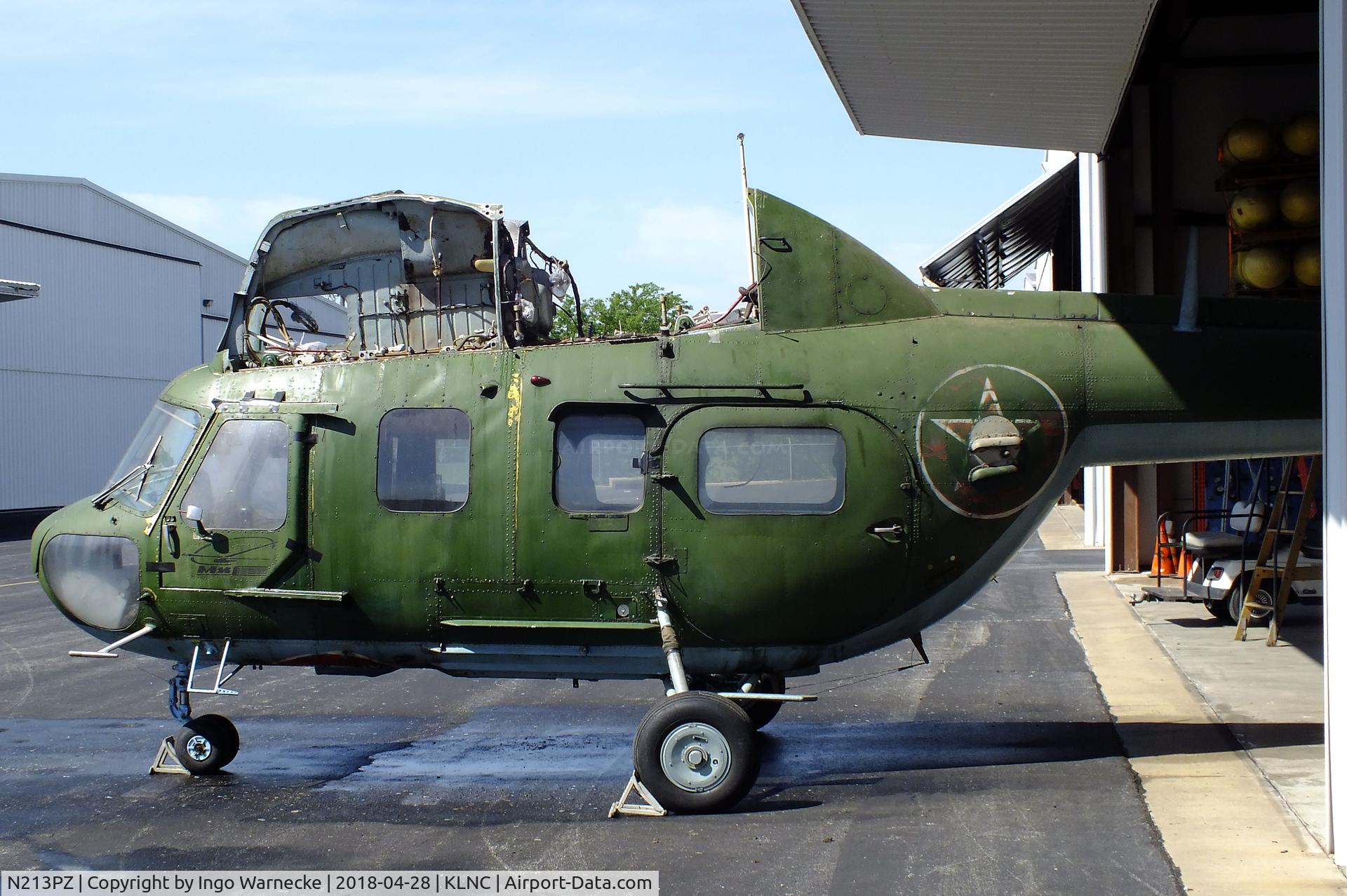 N213PZ, Mil MI-2 C/N 515250087, Mil Mi-2 HOPLITE undergoing maintenance / restoration in a hangar of the former Cold War Air Museum at Lancaster Regional Airport, Dallas County TX