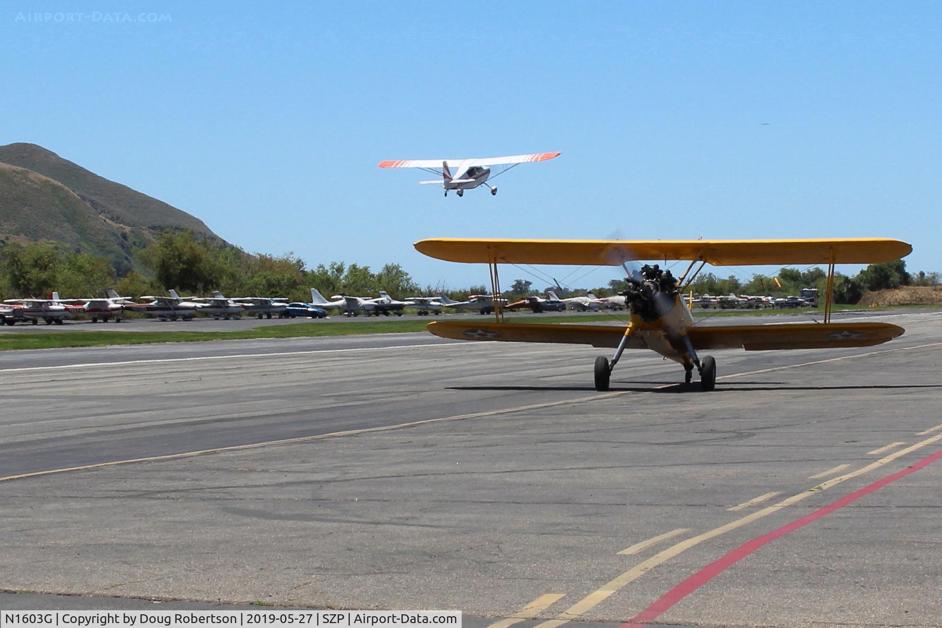 N1603G, 1968 Champion 7ECA Citabria C/N 609, 1968 Champion 7ECA CITABRIA, Lycoming O-320 150 Hp, takeoff climb Rwy 22, panned shot-an unintended twofer!