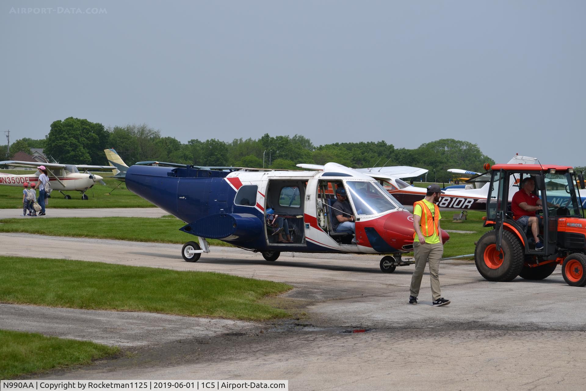 N990AA, 1982 Bell 222 C/N 47075, AC now being used as a ride, pulled by a tractor