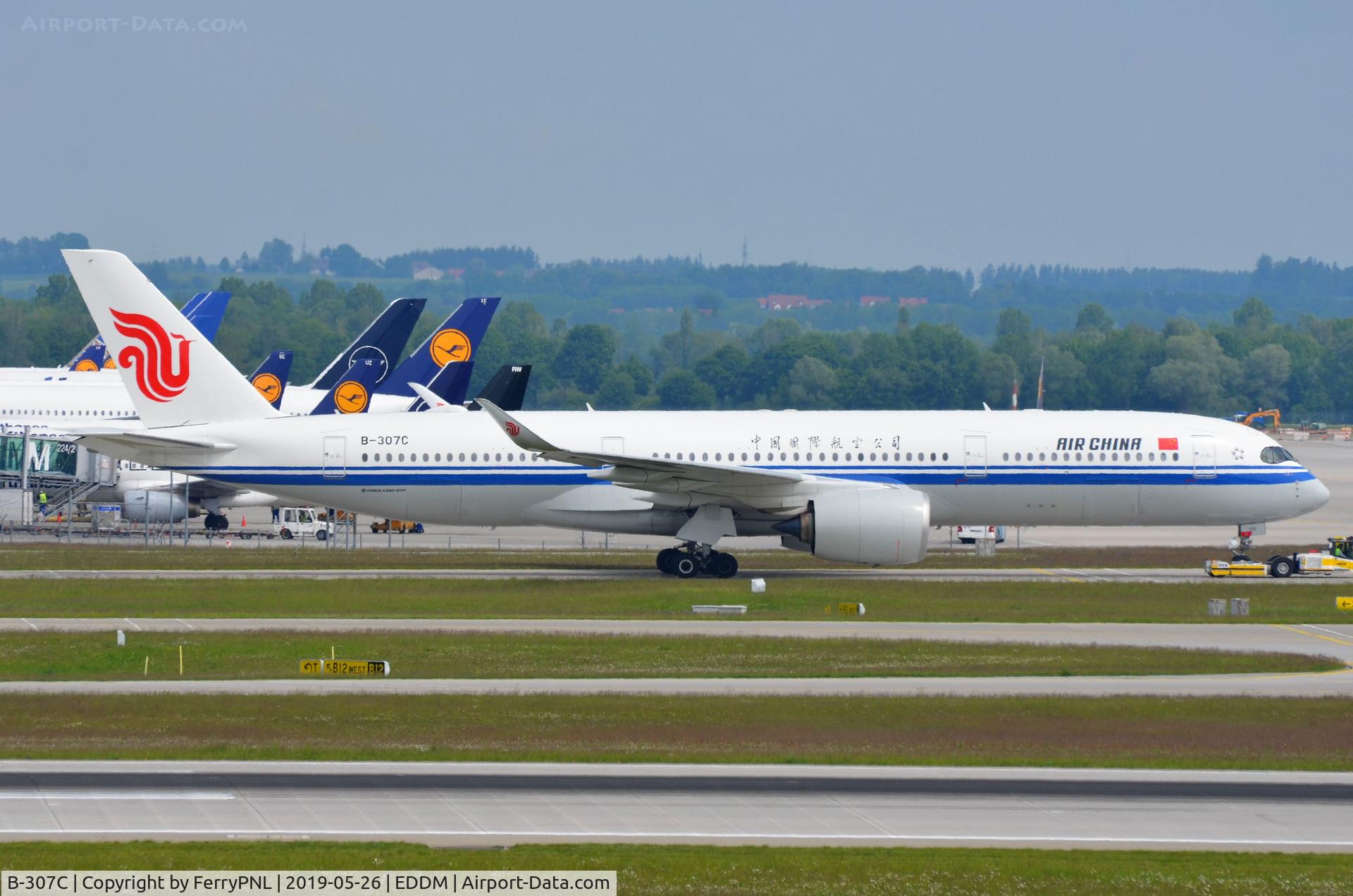B-307C, 2018 Airbus A350-941 C/N 284, Air China A359 under tow to its gate.