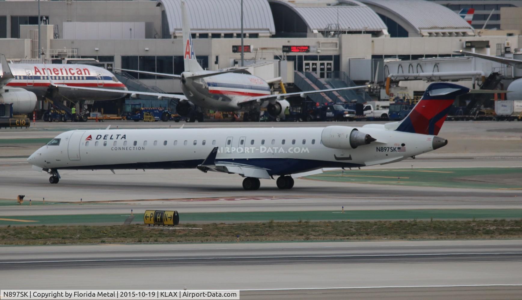 N897SK, 2006 Canadair CRJ-900LR (CL-600-2D24) C/N 15103, Delta Connection