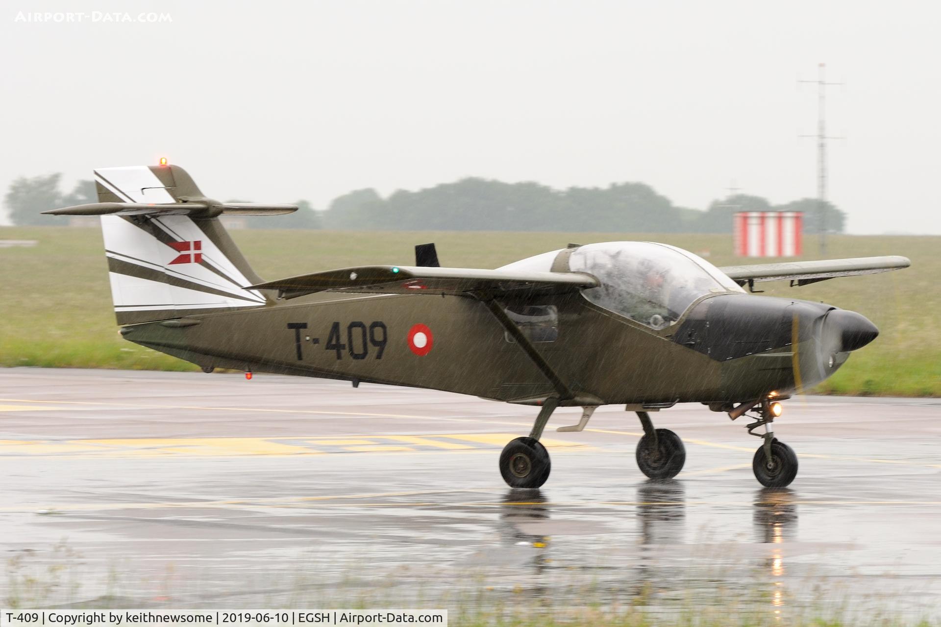 T-409, Saab T-17 Supporter C/N 15-209, Leaving very wet Norwich.