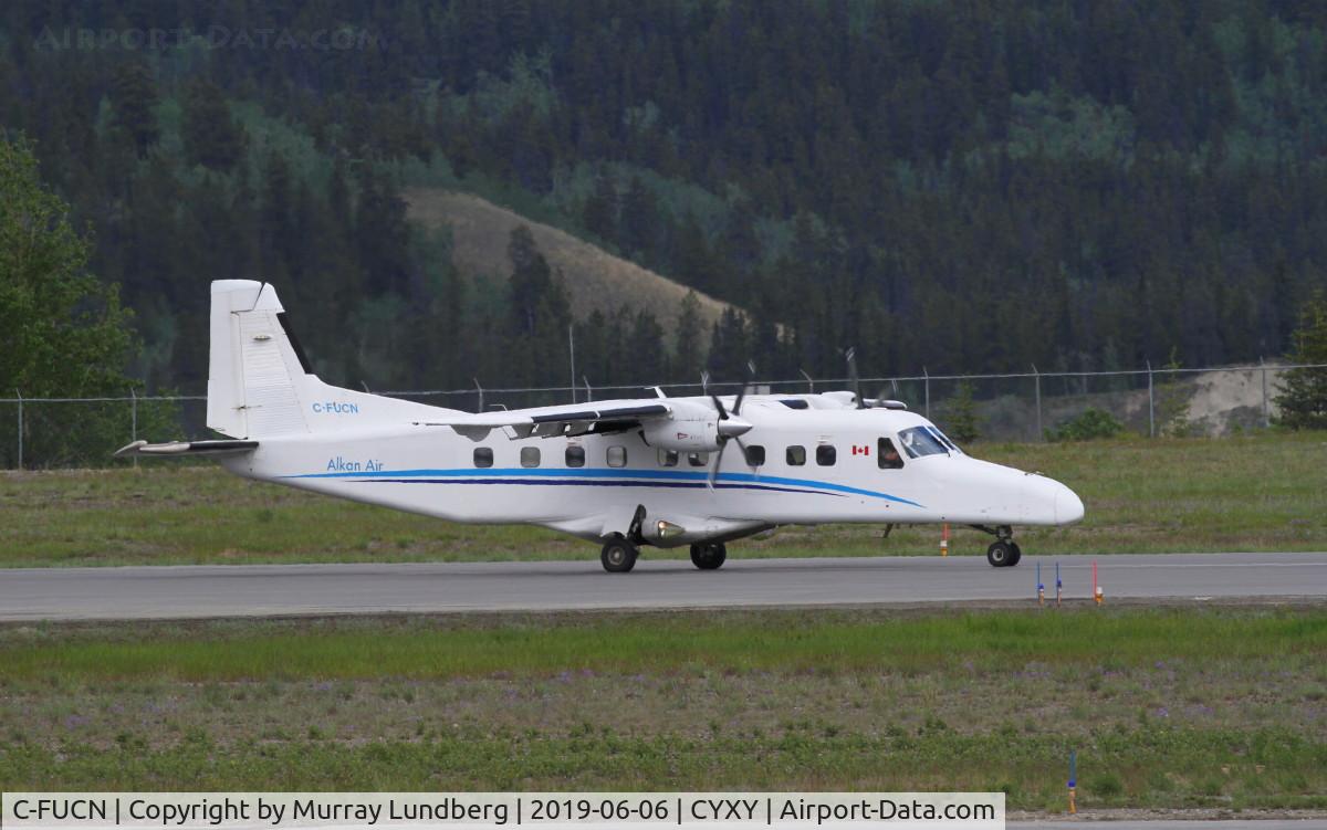C-FUCN, 1986 Dornier 228-202 C/N 8109, Taking off from Whitehorse, Yukon.
