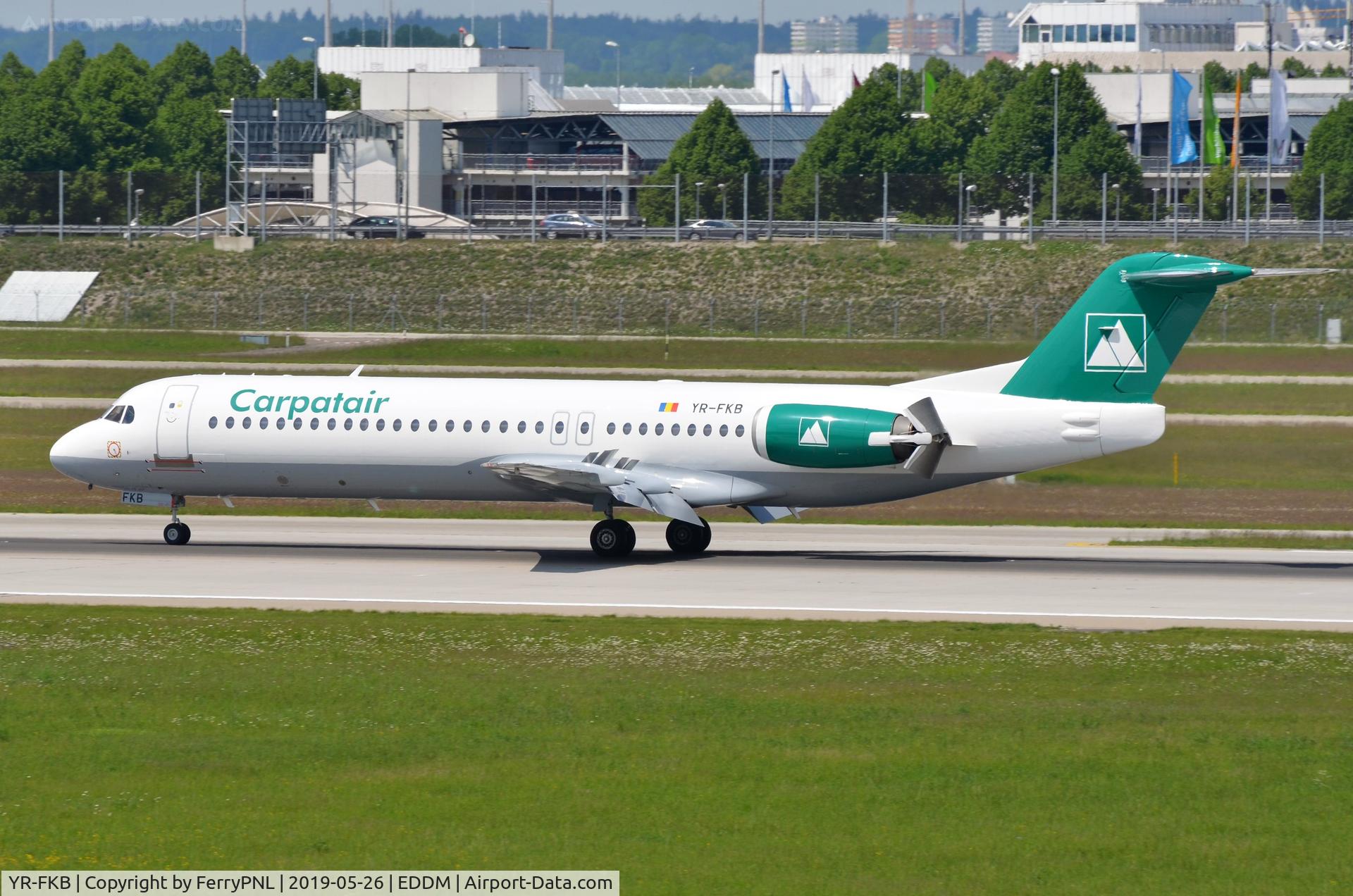 YR-FKB, 1991 Fokker 100 (F-28-0100) C/N 11369, Carpatair Fk100 applying reverse trust to come to a stop.