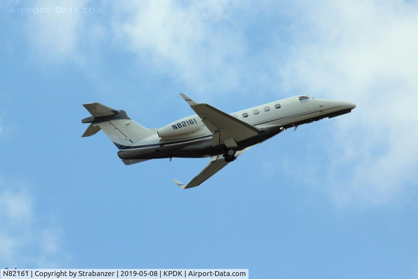 N82161, 2011 Embraer EMB-505 Phenom 300 C/N 50500054, Phenom 300 taking off from PDK
