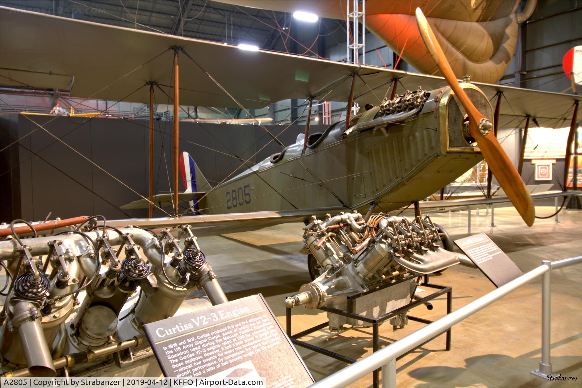 A2805, 1918 Curtiss JN-4D Jenny C/N 278, Curtiss JN-4D Jenny.   The Jenny was powered by the OX-5 engine seen on the right.
