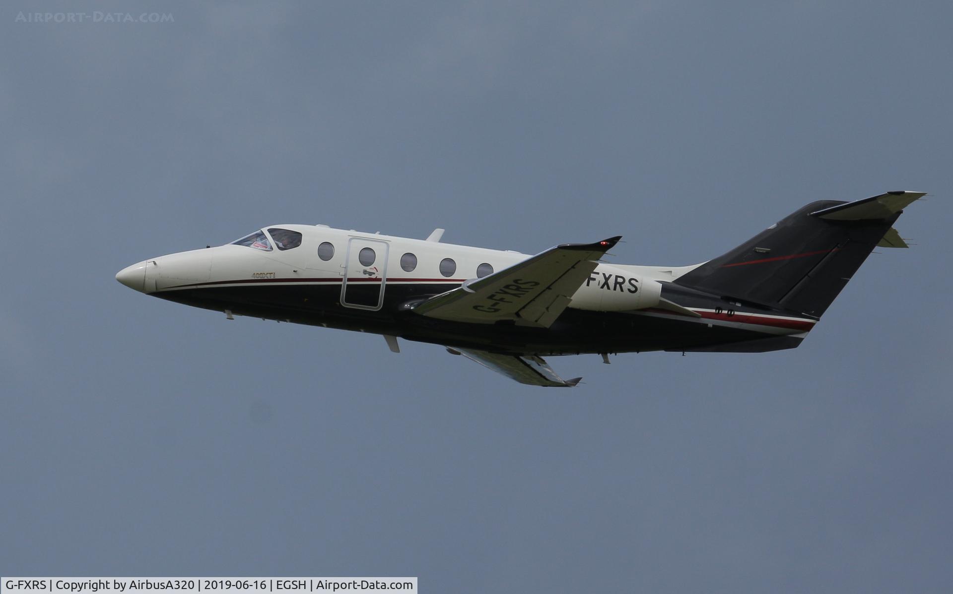 G-FXRS, 2001 Raytheon 400A Nextant 400XT C/N RK-317, Departing Rwy 27 at Norwich