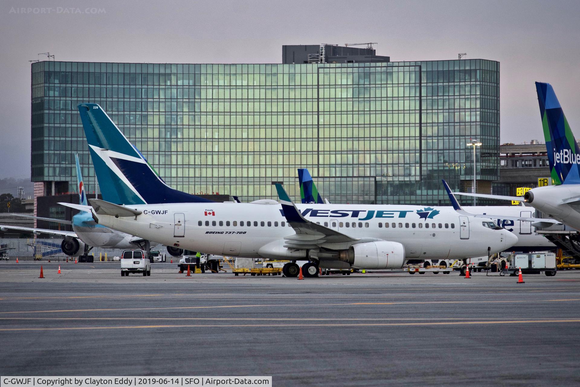 C-GWJF, 2004 Boeing 737-7CT C/N 32766, Grand Hyatt and 737 at SFO 2019.