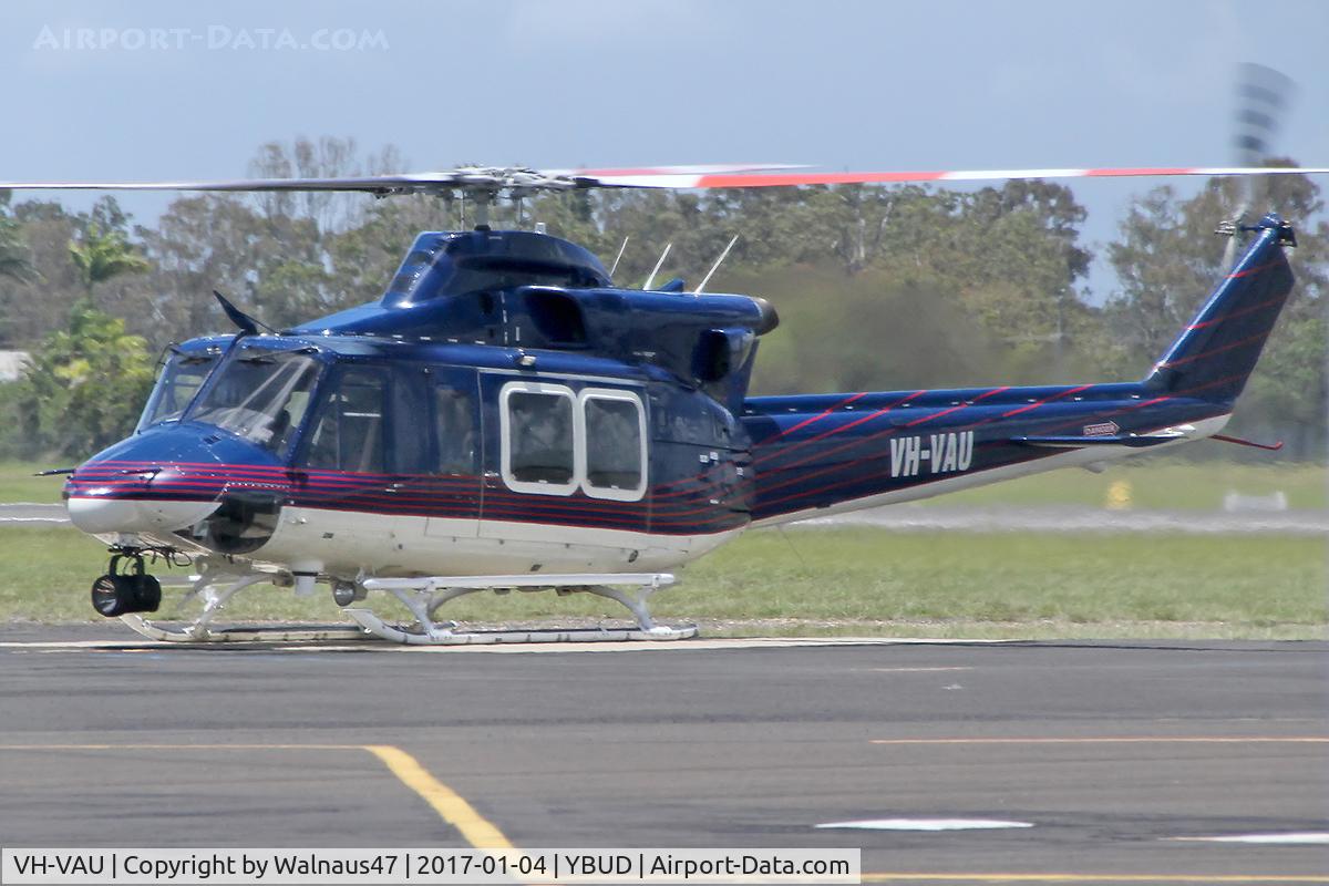 VH-VAU, 1998 Bell 412EP C/N 36203, Port side view of Bell 412EP VH-VAU Cn 36203 with rotors turning and a Nite-Sun searchlight fitted at Bundaberg Airport YBUD on 04Jan2017.