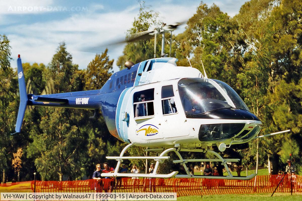 VH-YAW, 1973 Bell 206B Jetranger II C/N 942, Virgin Helicopters ACT Bell 206B JetRanger VH-YAW Cn 942 hovering close to Lake Burley Griffin Canberra during Canberra Week festivities on 15Mar1999 (Canberra Day).