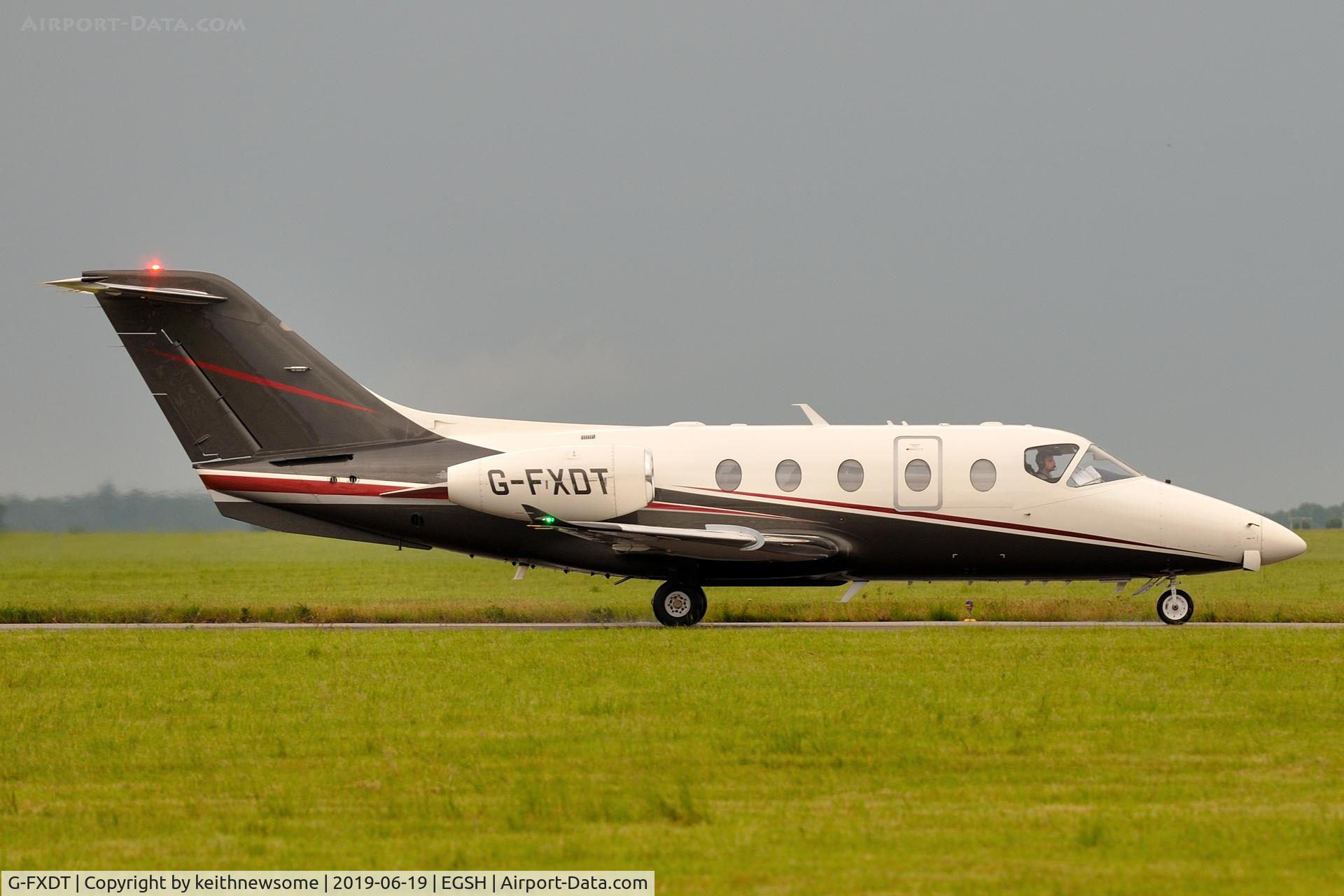 G-FXDT, 2004 Raytheon Beechjet 400A/Nextant N400XT C/N RK-397, Arriving at Norwich from Inverness.