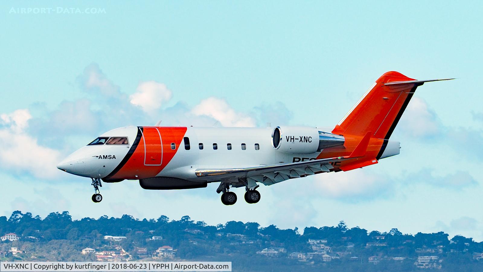 VH-XNC, 2005 Bombardier Challenger 604 (CL-600-2B16) C/N 5619, Bombardier Challenger 604, VH-XNC final runway 03 23/06/18.