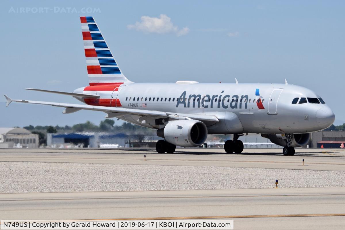 N749US, 2000 Airbus A319-112 C/N 1313, Taxiing off RWY 28L.