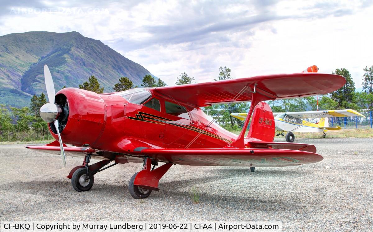CF-BKQ, 1943 Beech D17S Staggerwing C/N 4849, Among the aircraft at a Canadian Owners and Pilots Association fly-in at Carcross, Yukon.
