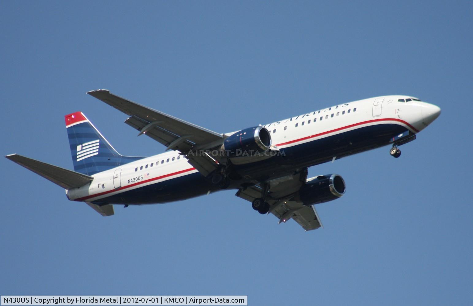 N430US, 1989 Boeing 737-4B7 C/N 24552, MCO spotting