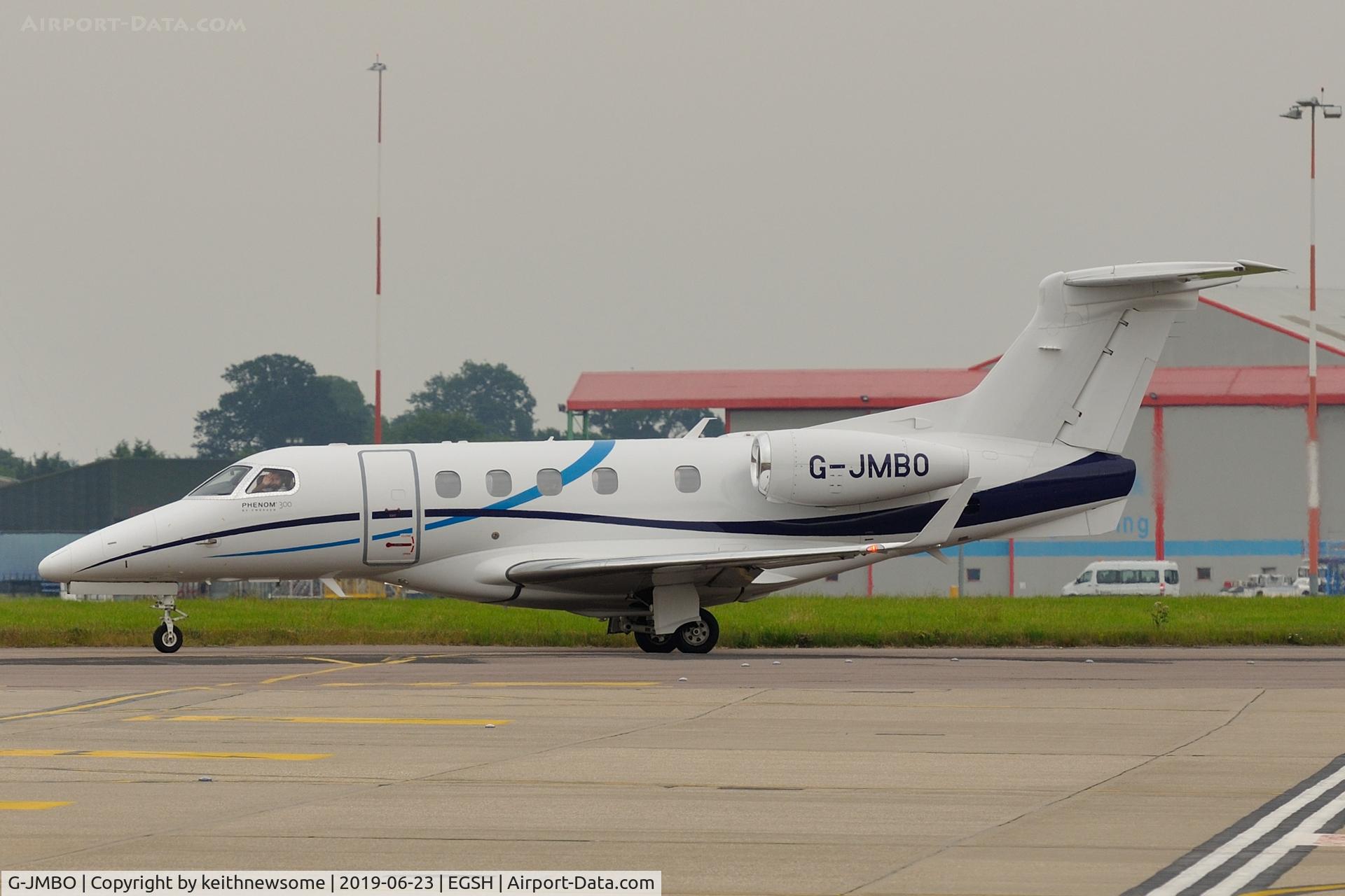 G-JMBO, 2016 Embraer EMB-505 Phenom 300 C/N 50500366, Leaving Norwich for Liverpool.
