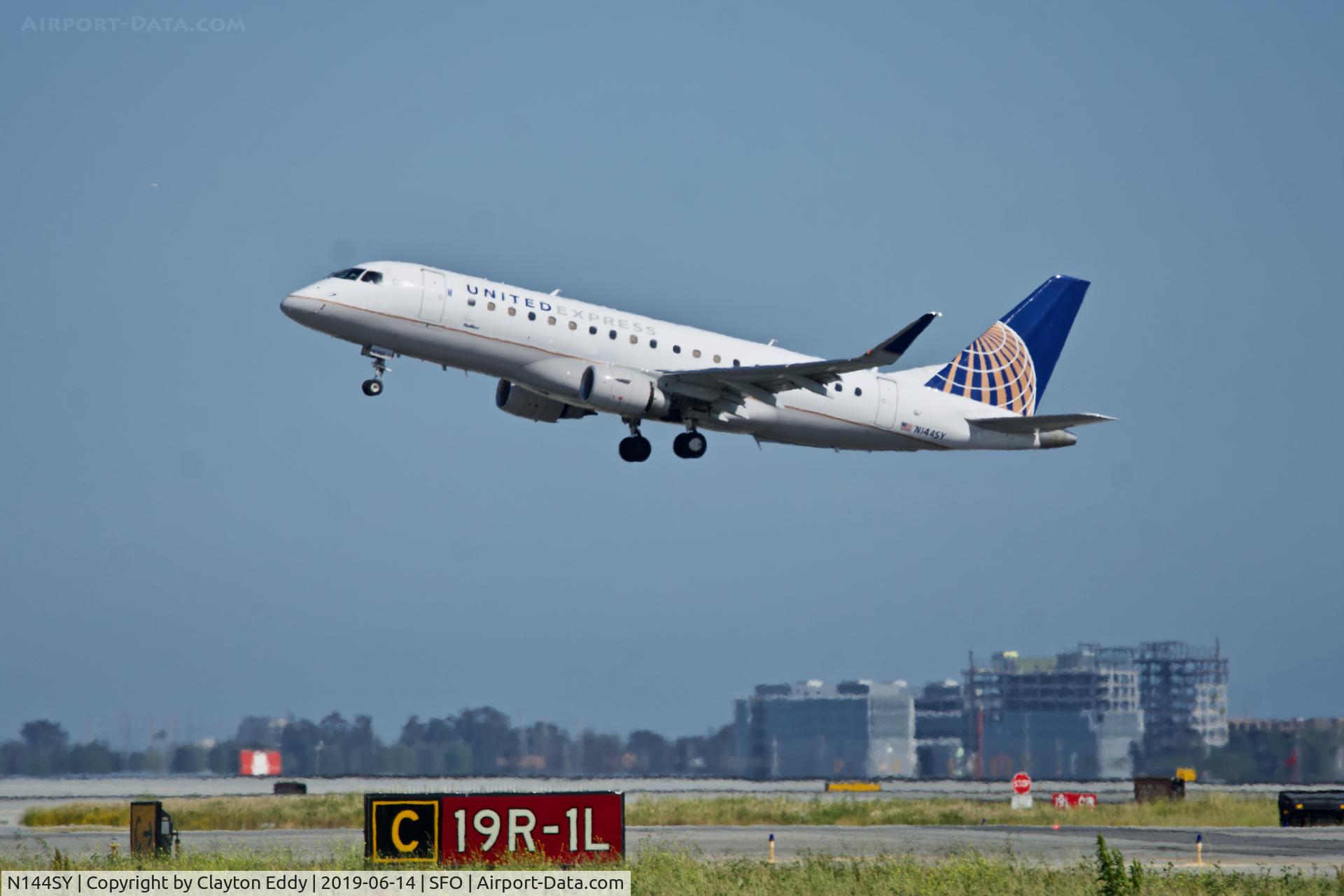 N144SY, 2015 Embraer 175LR (ERJ-170-200LR) C/N 17000482, Departing runway 01 at SFO 2019.